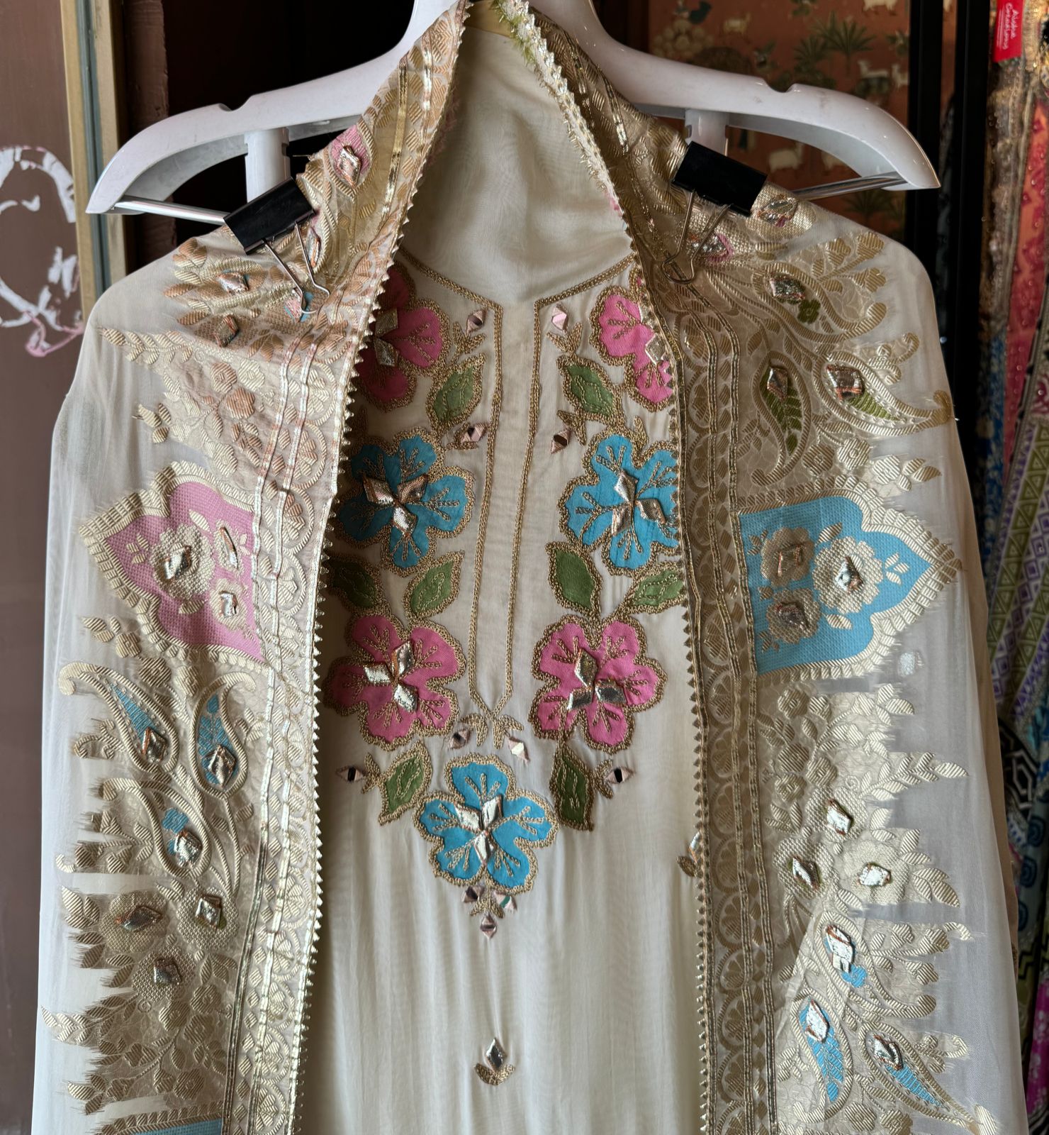 Soft organza Shirt unstitched Shirt with floral shimmer handcraft patchwork And zari Kadhai on it.