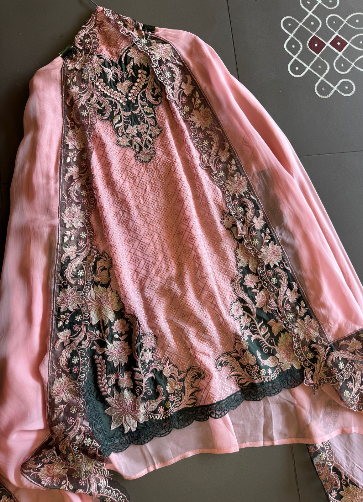 Soft organza self embroidered base with embroidered patchwork on the neckline with designer ghera and lacework done