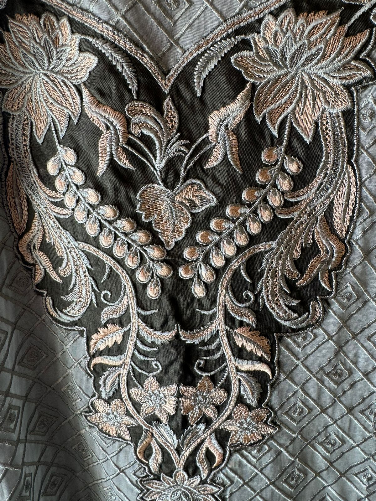 Soft organza self embroidered base with embroidered patchwork on the neckline with designer ghera and lacework done