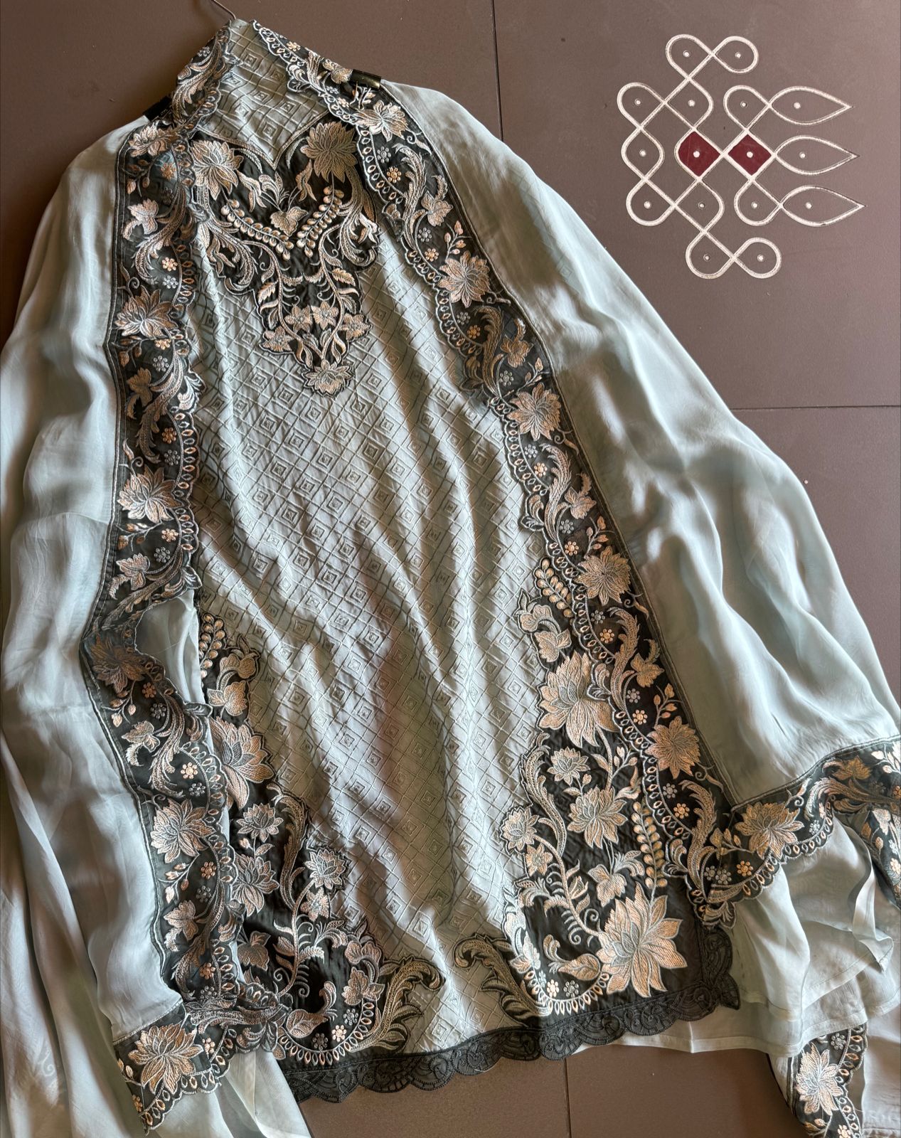 Soft organza self embroidered base with embroidered patchwork on the neckline with designer ghera and lacework done