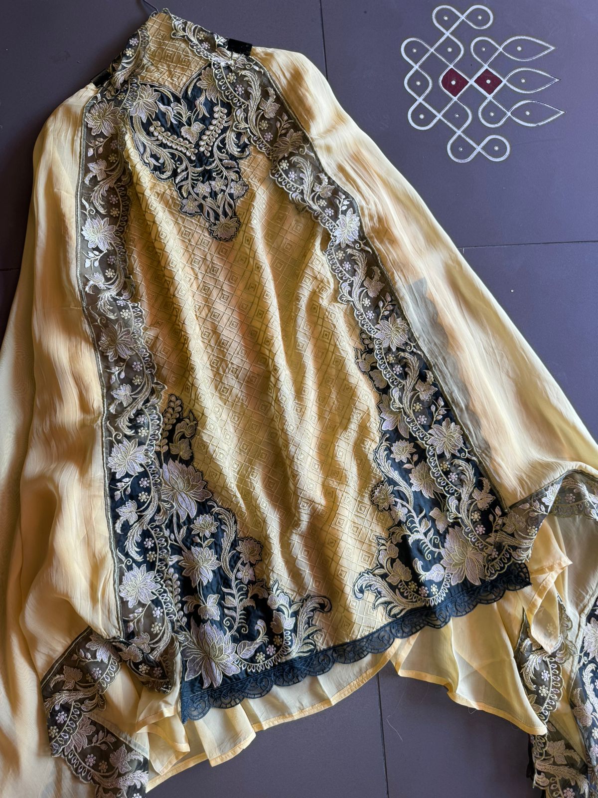 Soft organza self embroidered base with embroidered patchwork on the neckline with designer ghera and lacework done