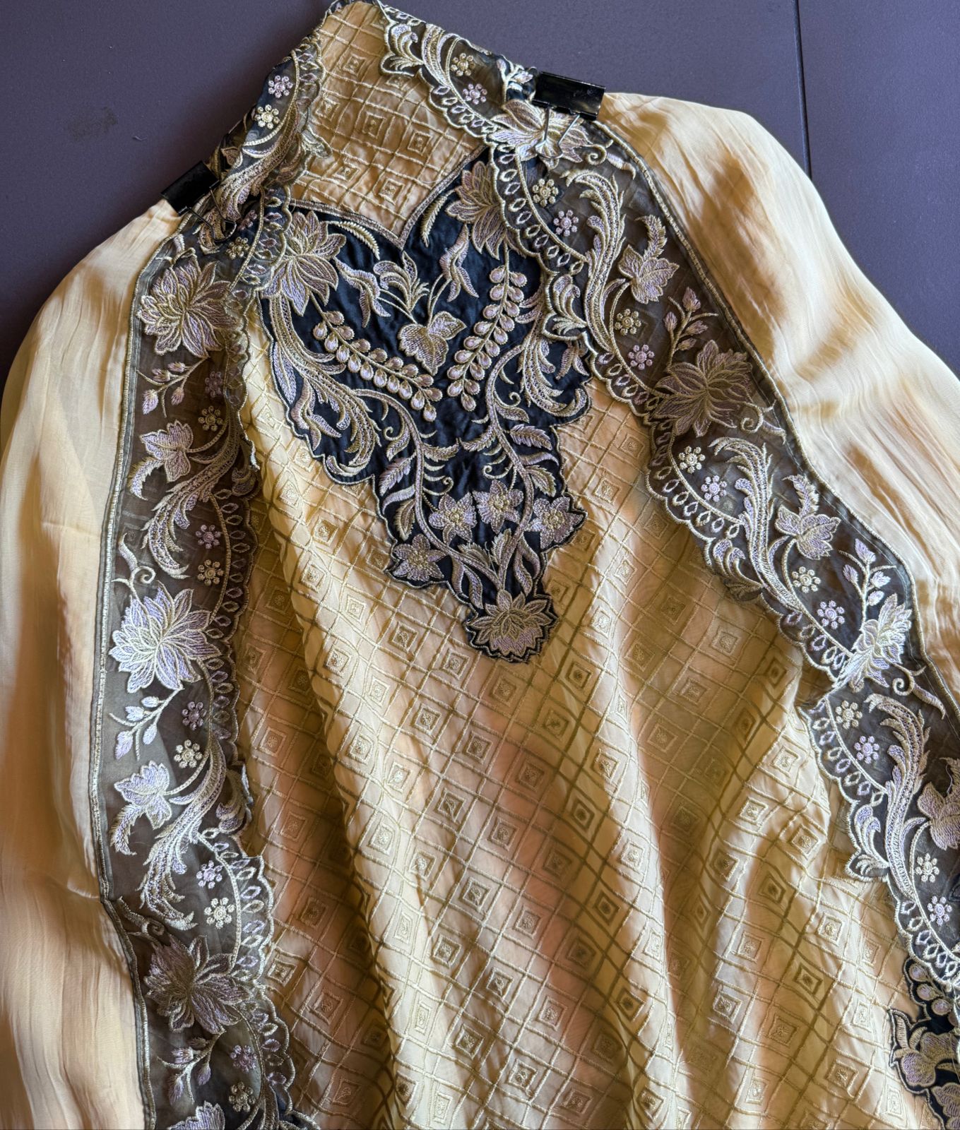 Soft organza self embroidered base with embroidered patchwork on the neckline with designer ghera and lacework done