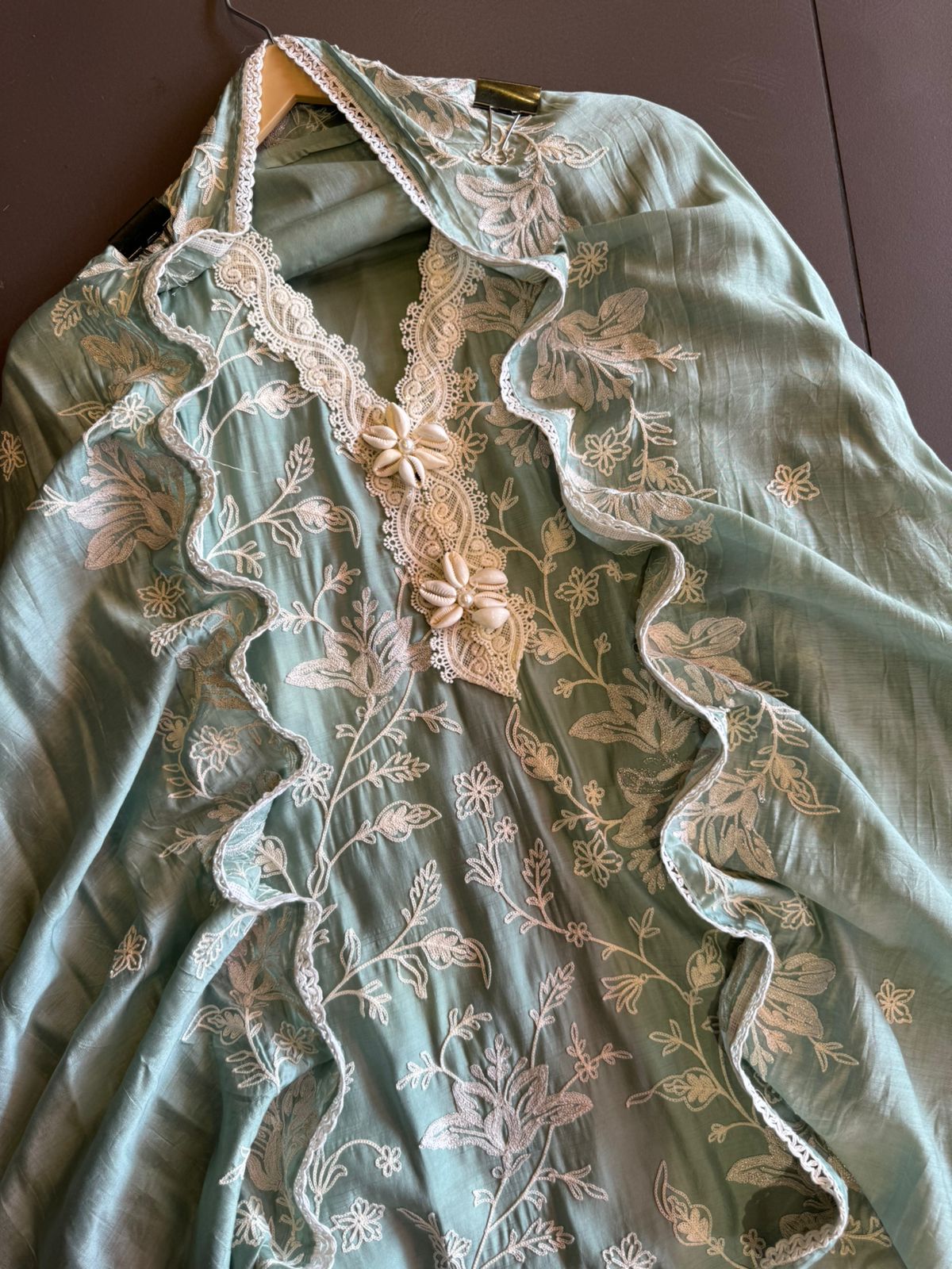 Soft linen cotton shirt (Unstitched)with crochia lace neck detailings with original shankh attached on the neckline