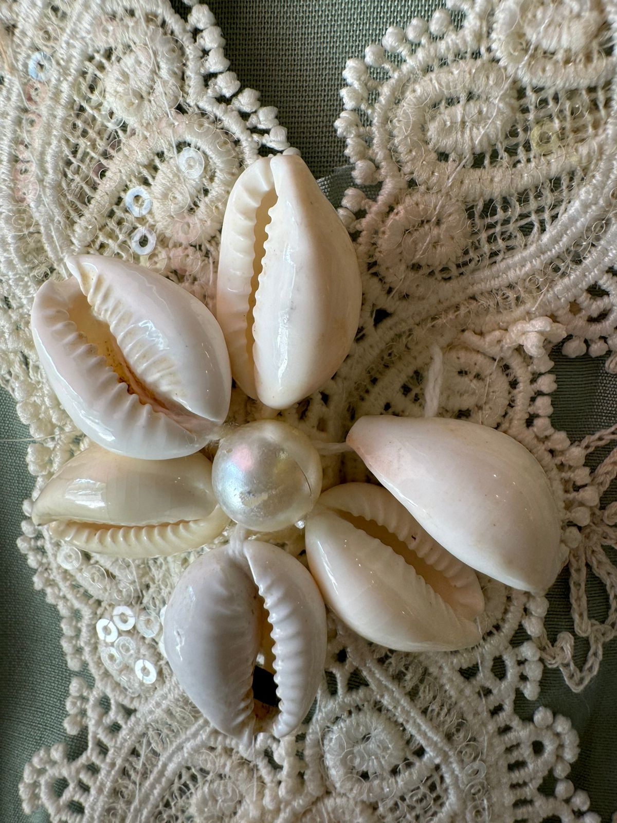 Soft linen cotton shirt (Unstitched)with crochia lace neck detailings with original shankh attached on the neckline