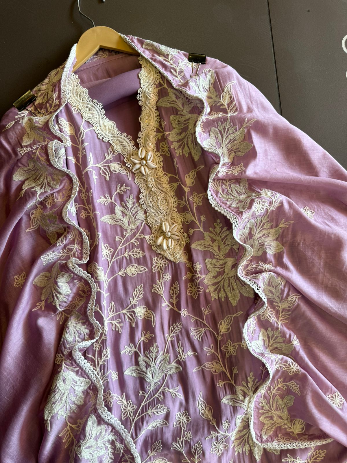 Soft linen cotton shirt (Unstitched)with crochia lace neck detailings with original shankh attached on the neckline