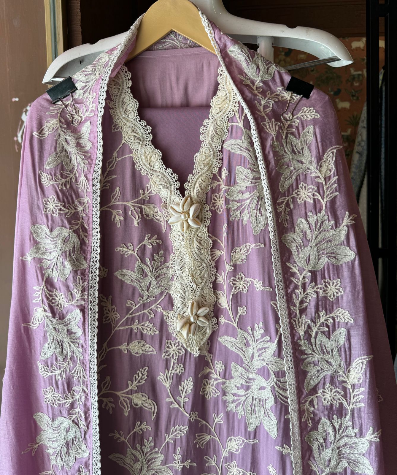 Soft linen cotton shirt (Unstitched)with crochia lace neck detailings with original shankh attached on the neckline