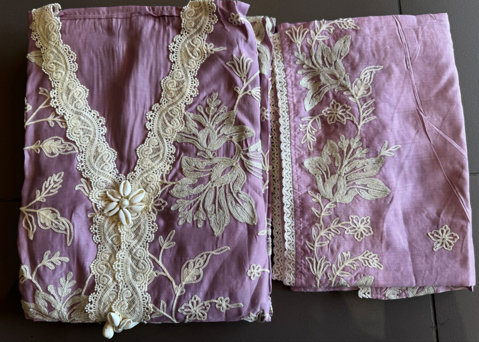 Soft linen cotton shirt (Unstitched)with crochia lace neck detailings with original shankh attached on the neckline