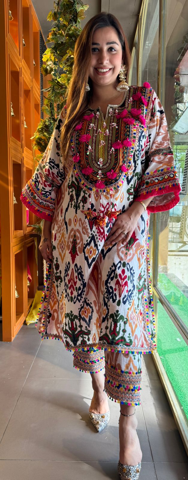 Cotton linen Ikkat printed kurta with Colourful thread work patch on the neck front and back as well