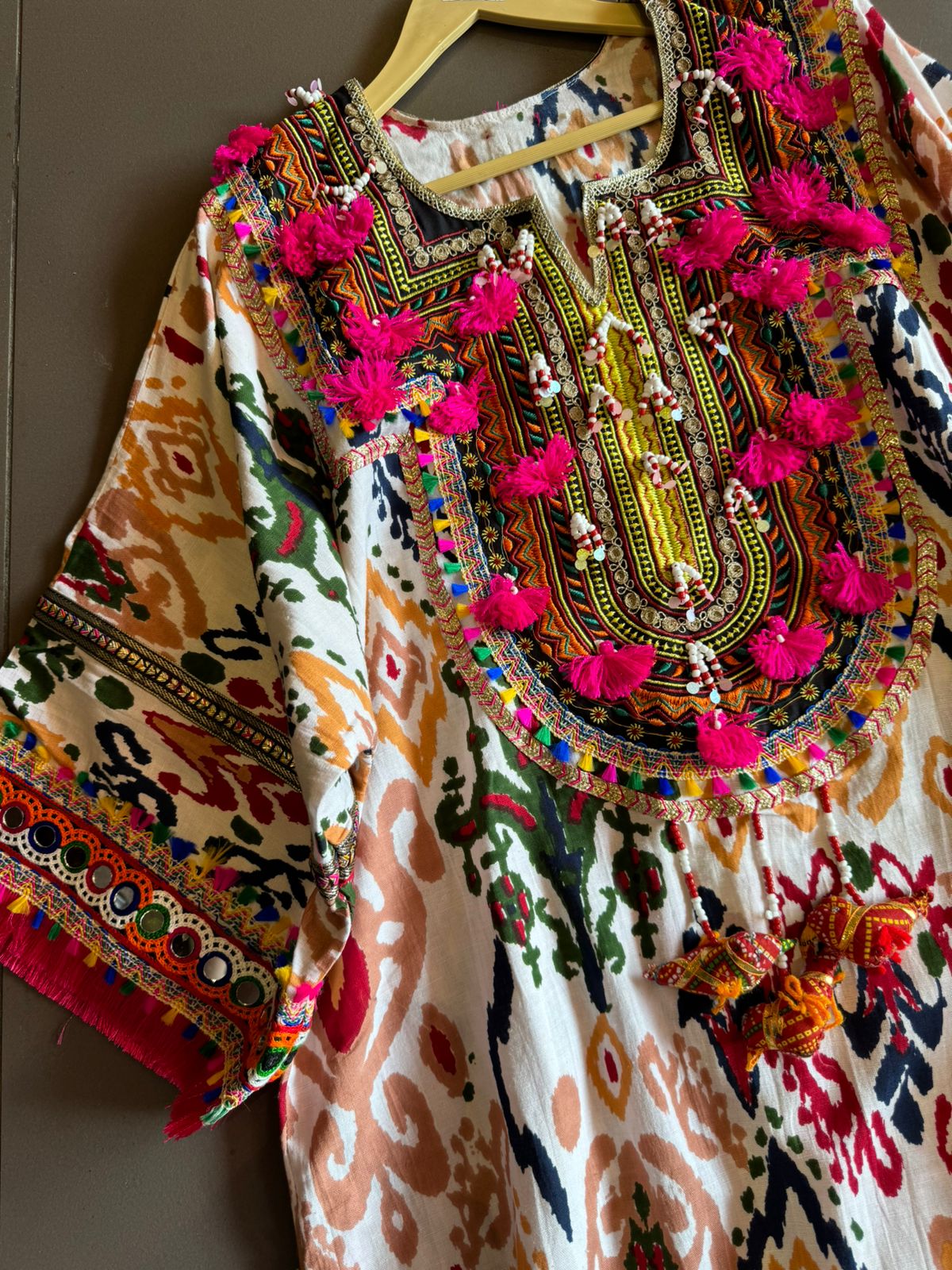 Cotton linen Ikkat printed kurta with Colourful thread work patch on the neck front and back as well