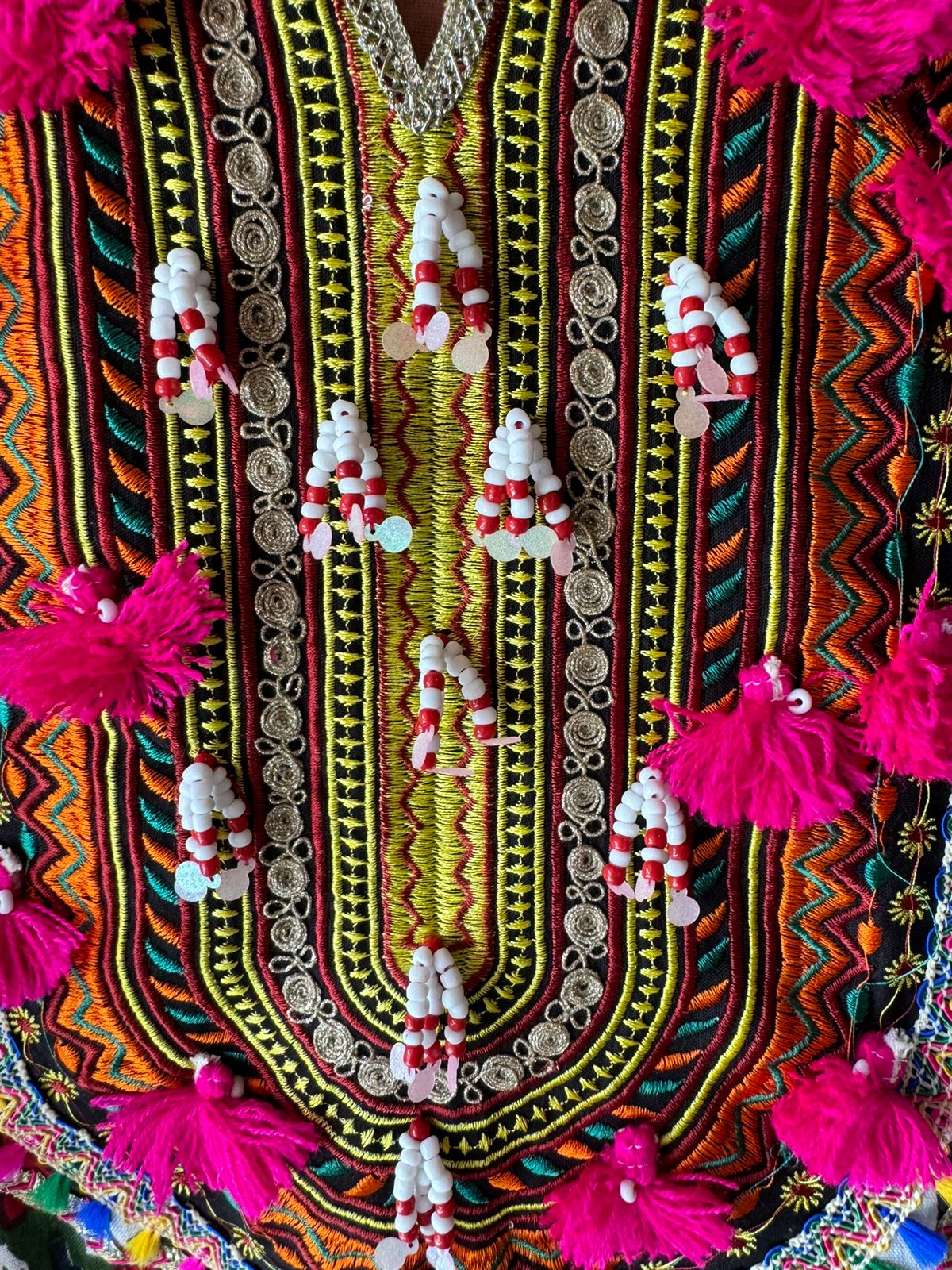 Cotton linen Ikkat printed kurta with Colourful thread work patch on the neck front and back as well