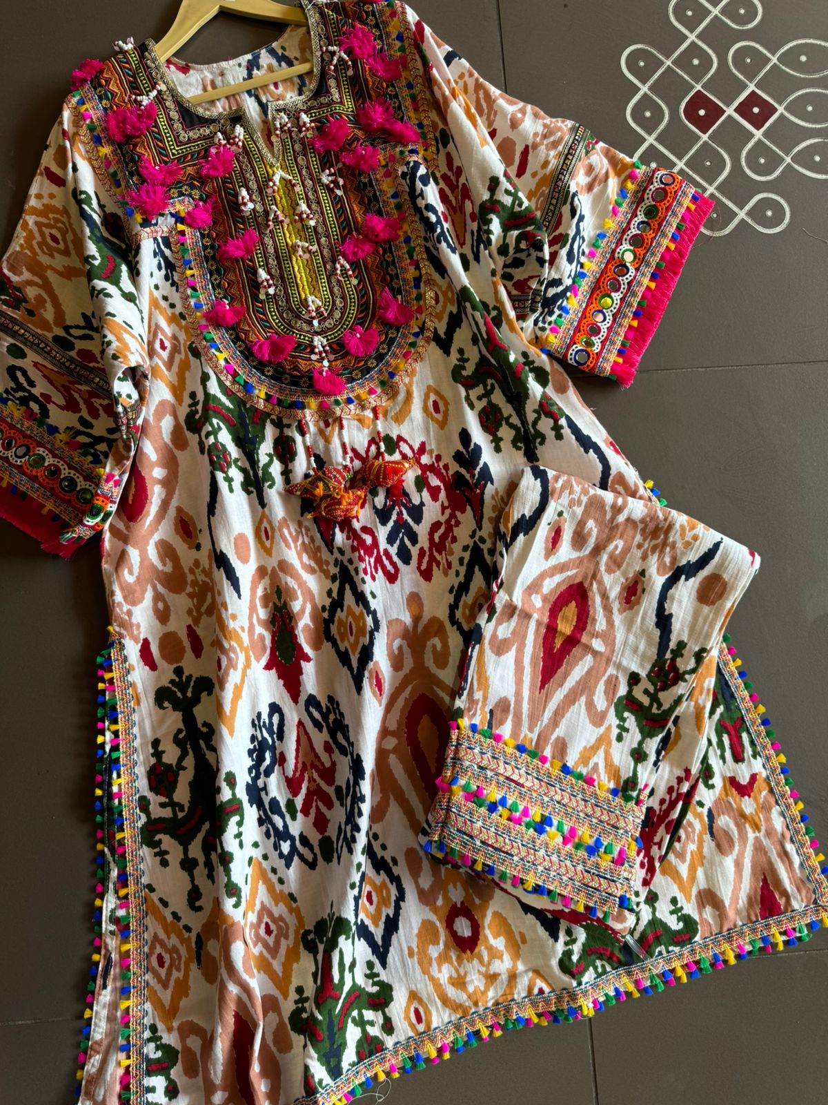 Cotton linen Ikkat printed kurta with Colourful thread work patch on the neck front and back as well