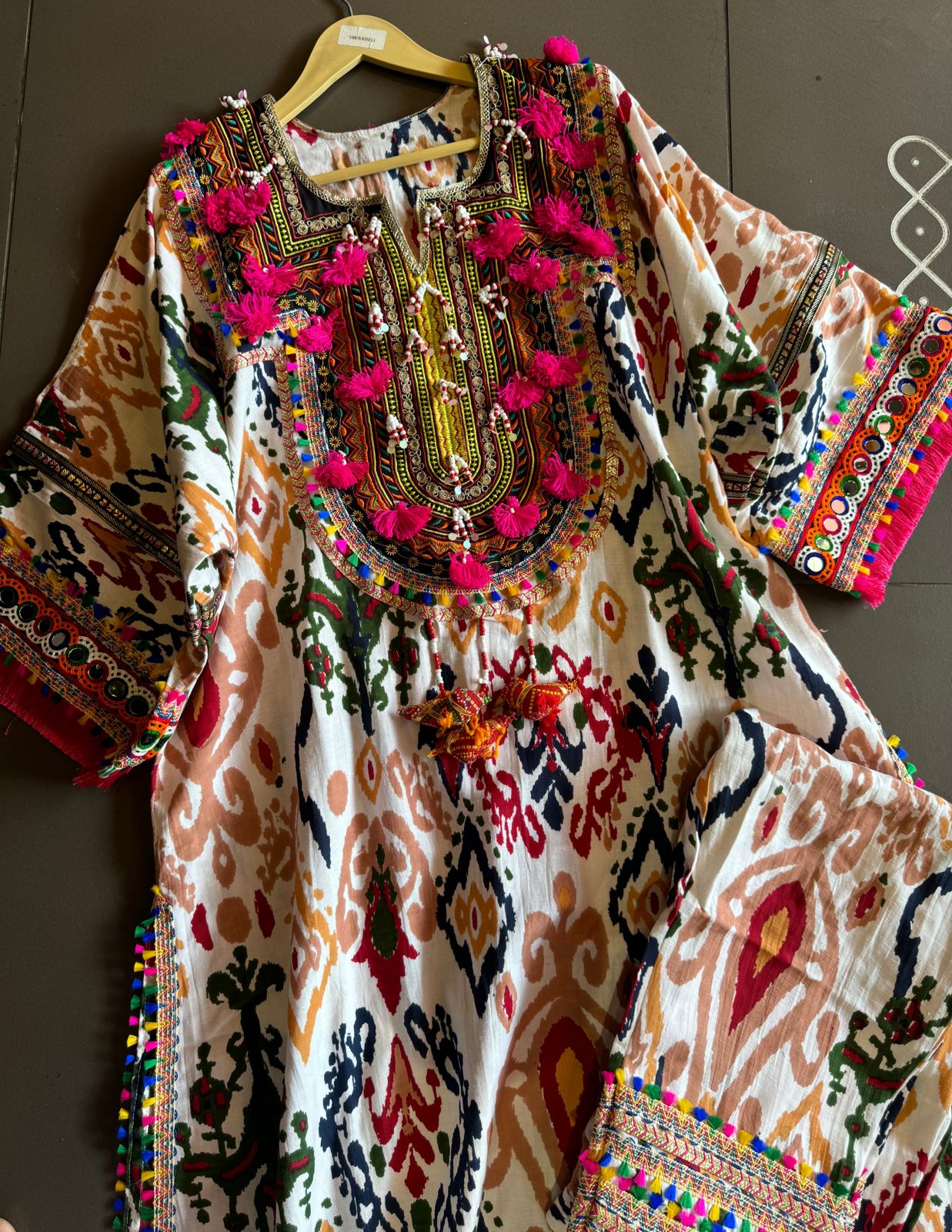 Cotton linen Ikkat printed kurta with Colourful thread work patch on the neck front and back as well