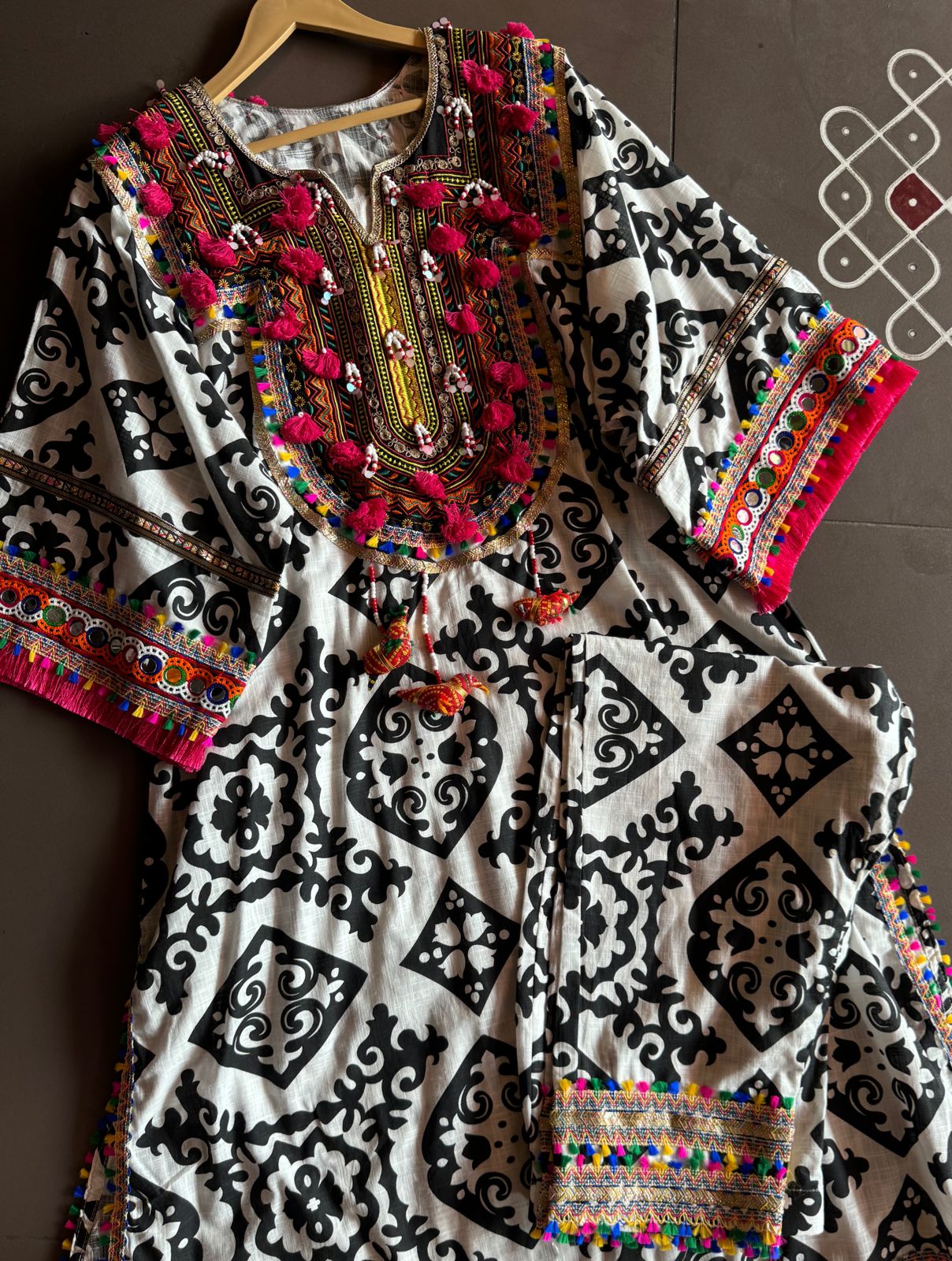 Cotton linen Ikkat printed kurta with Colourful thread work patch on the neck front and back as wel
