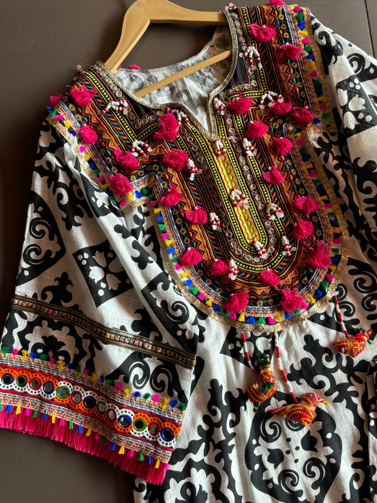 Cotton linen Ikkat printed kurta with Colourful thread work patch on the neck front and back as wel