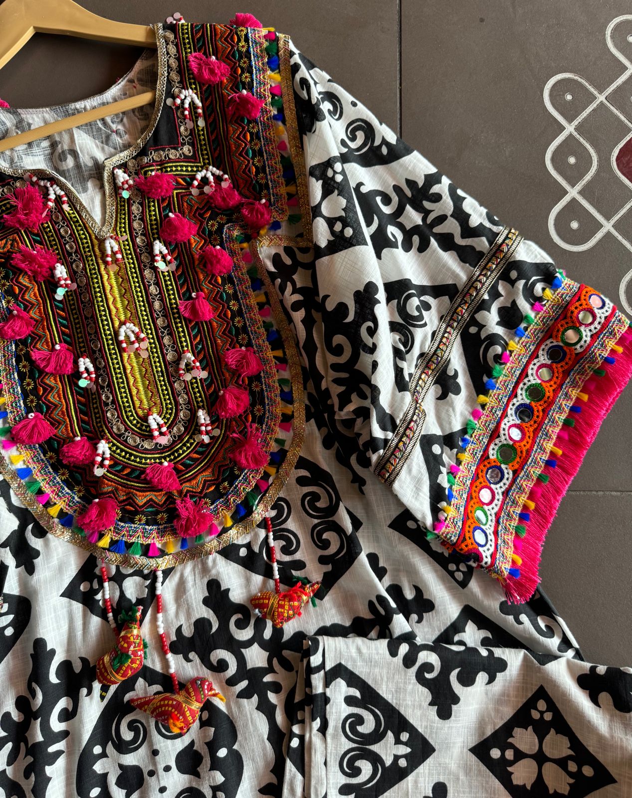 Cotton linen Ikkat printed kurta with Colourful thread work patch on the neck front and back as wel