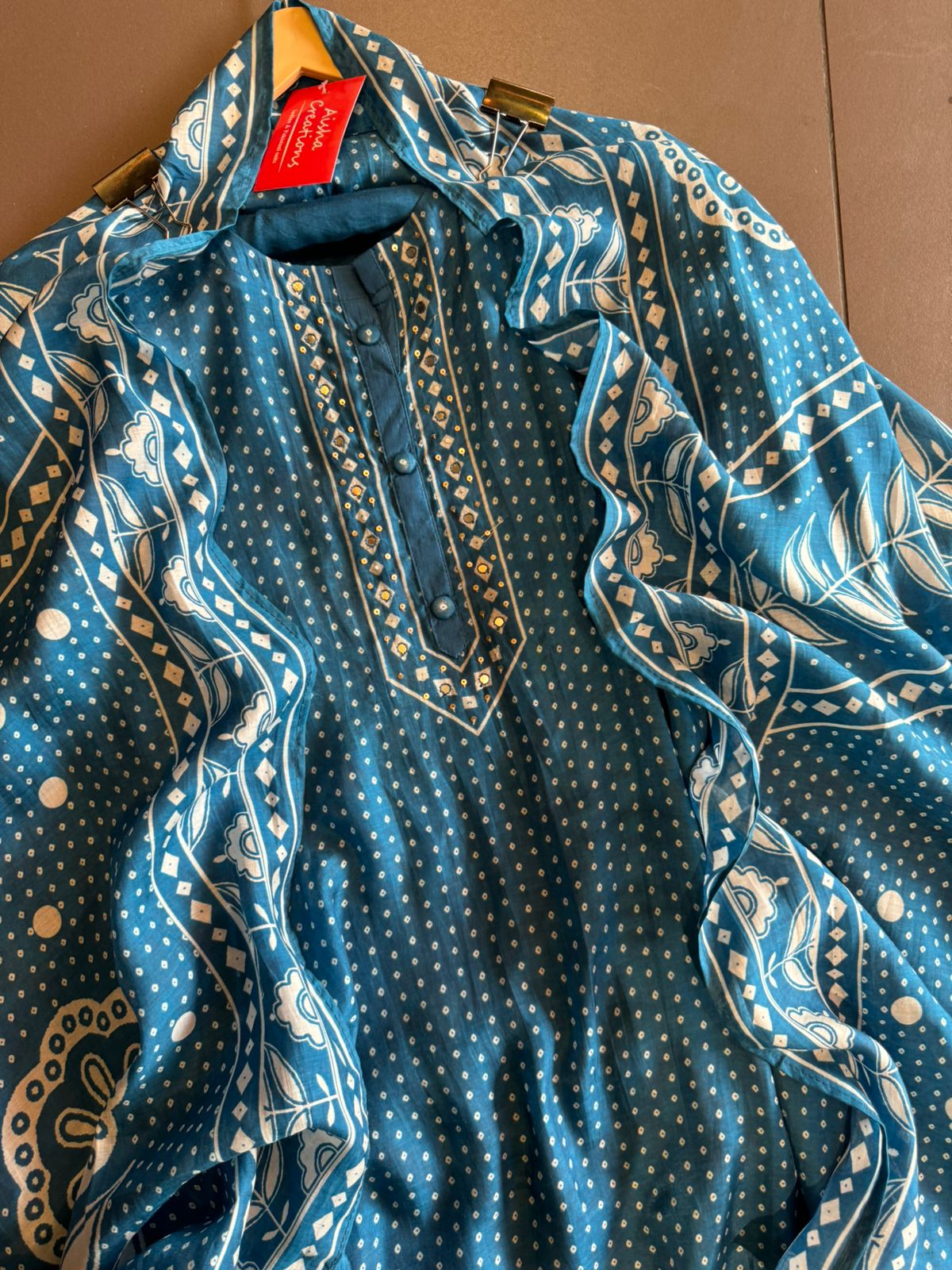 Pure Muslin digital printed suit with handwork highlighting on the neckline