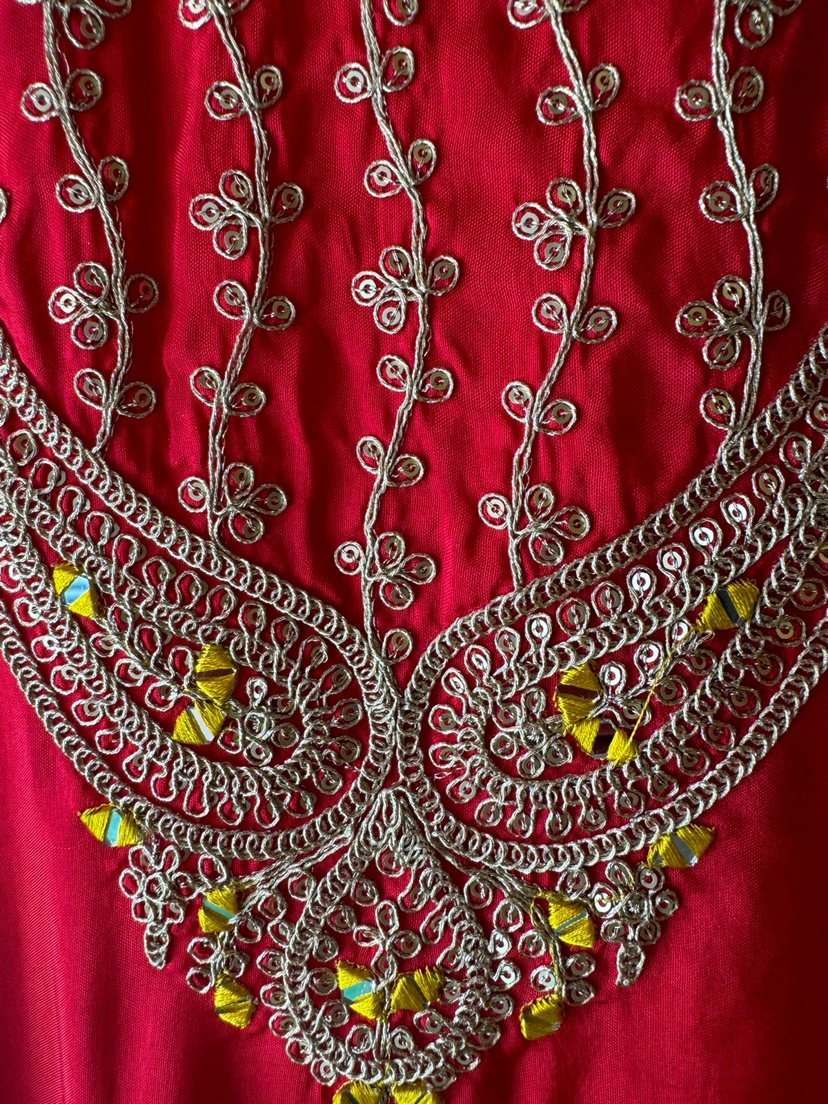 Pure silk unstitched shirt with beautiful designer embroidery on neckline and bootas all over the shirt