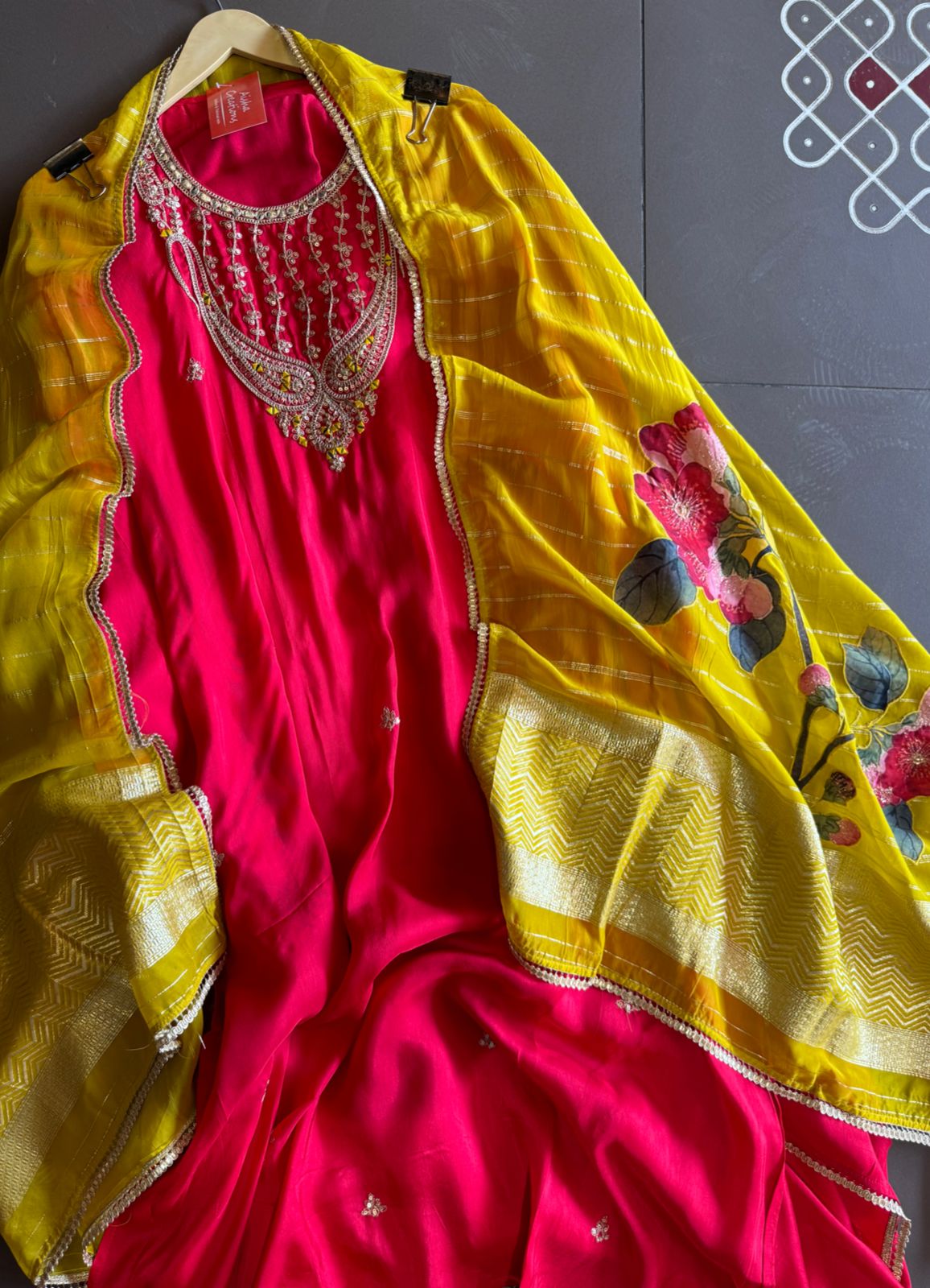 Pure silk unstitched shirt with beautiful designer embroidery on neckline and bootas all over the shirt