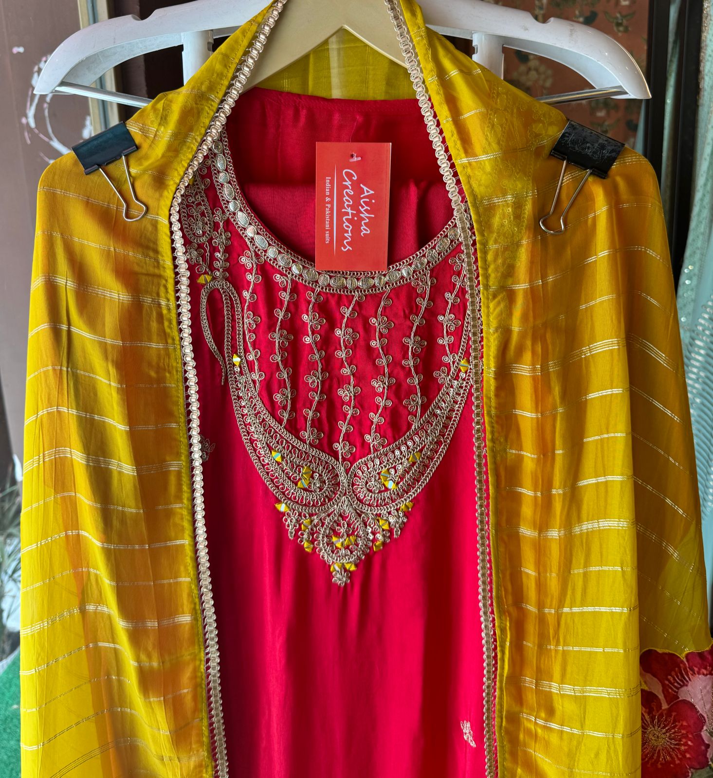 Pure silk unstitched shirt with beautiful designer embroidery on neckline and bootas all over the shirt