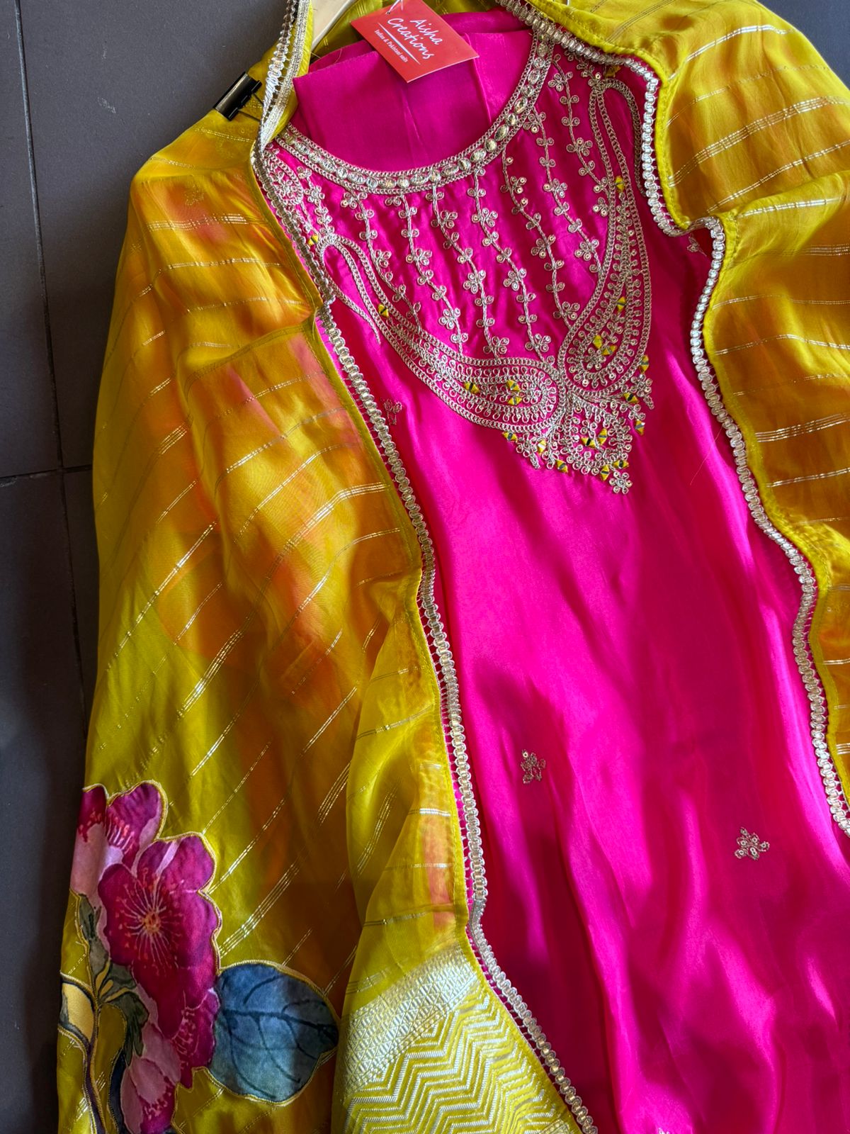 Pure silk unstitched shirt with beautiful designer embroidery on neckline and bootas all over the shirt