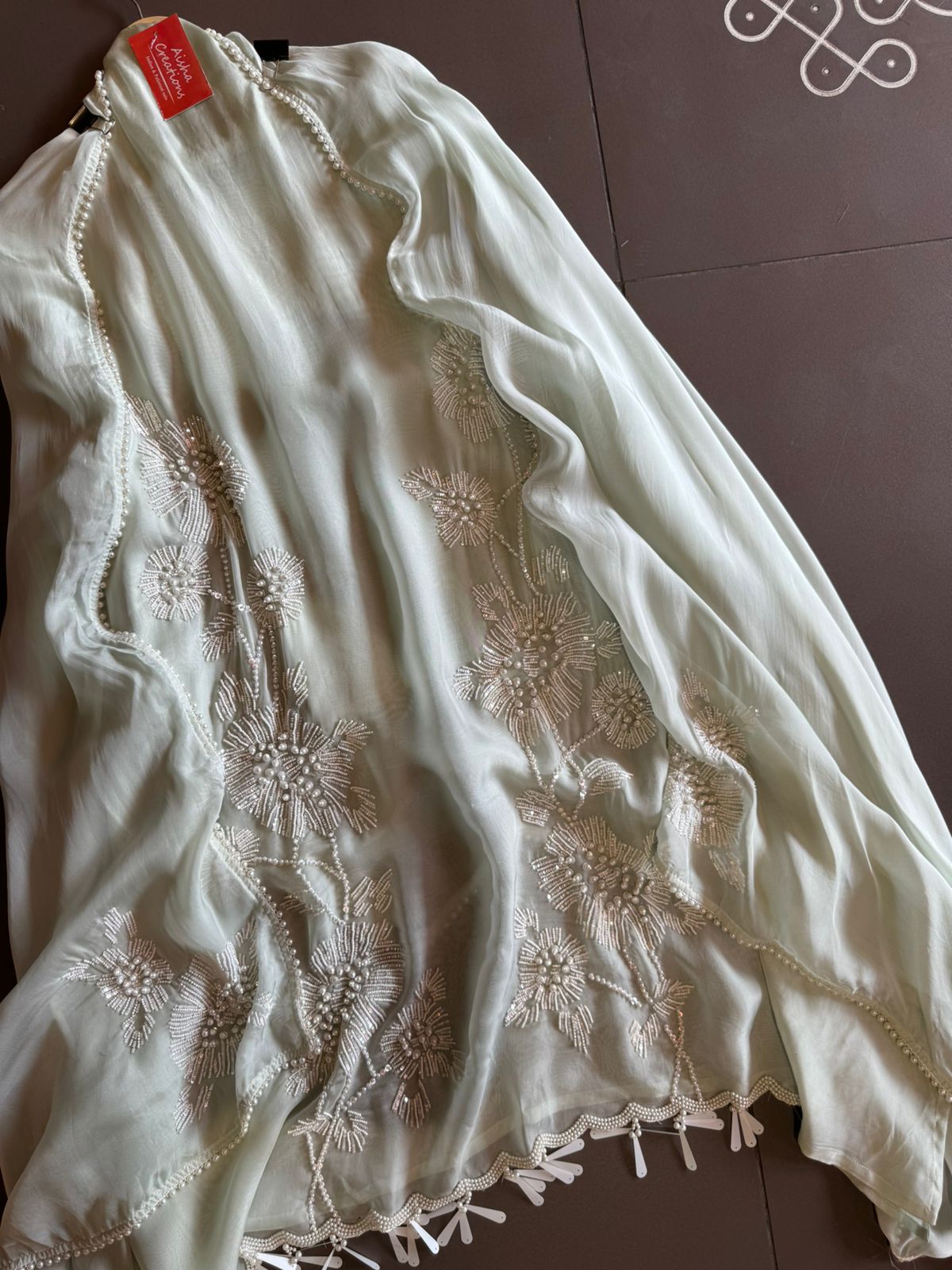 Shop our new exclusive range of Pakistani fabrics on soft organza with original pearl and Moti work