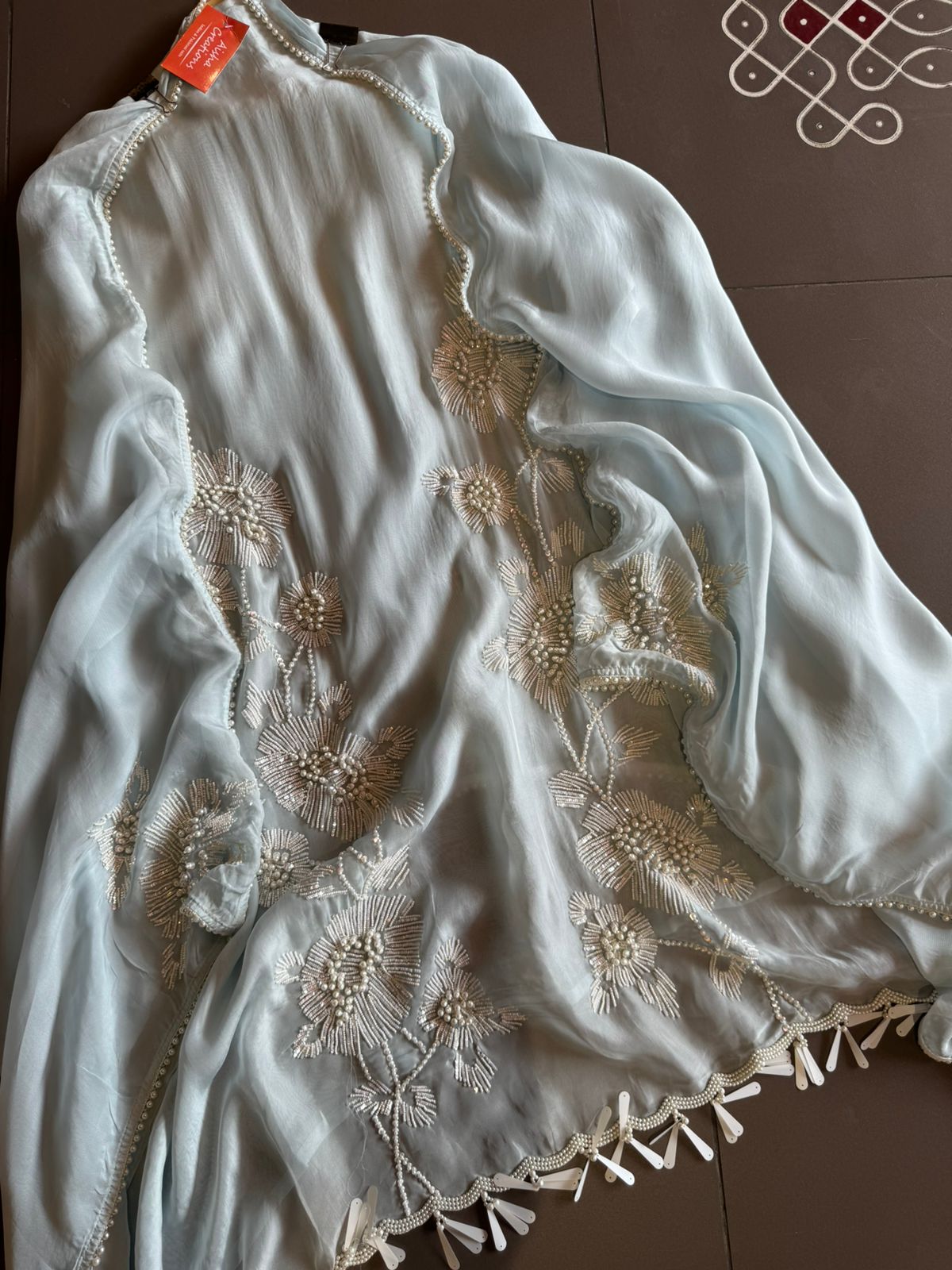 Shop our new exclusive range of Pakistani fabrics on soft organza with original pearl and Moti work