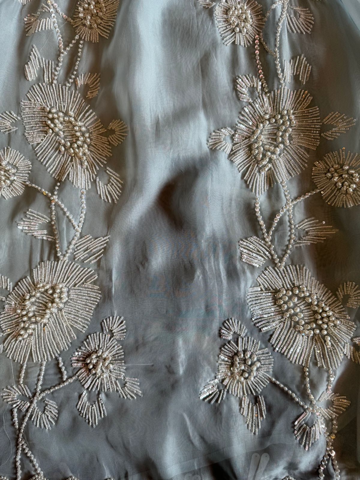 Shop our new exclusive range of Pakistani fabrics on soft organza with original pearl and Moti work