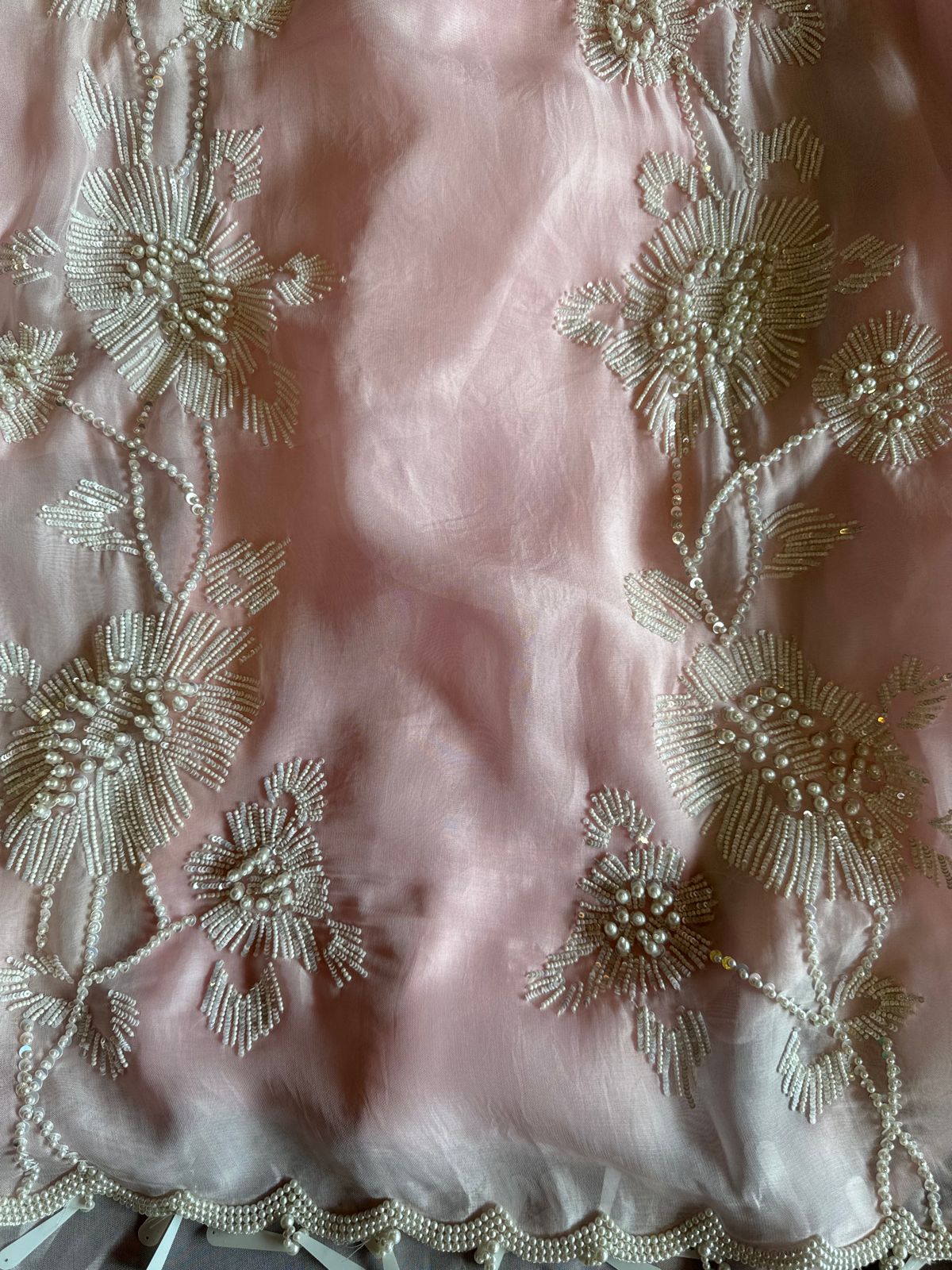 Shop our new exclusive range of Pakistani fabrics on soft organza with original pearl and Moti work