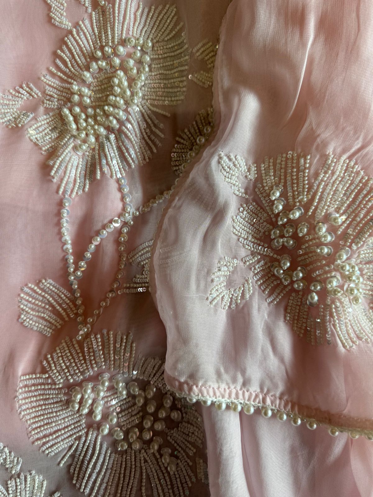 Shop our new exclusive range of Pakistani fabrics on soft organza with original pearl and Moti work