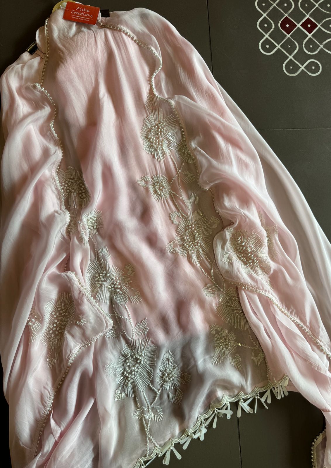 Shop our new exclusive range of Pakistani fabrics on soft organza with original pearl and Moti work