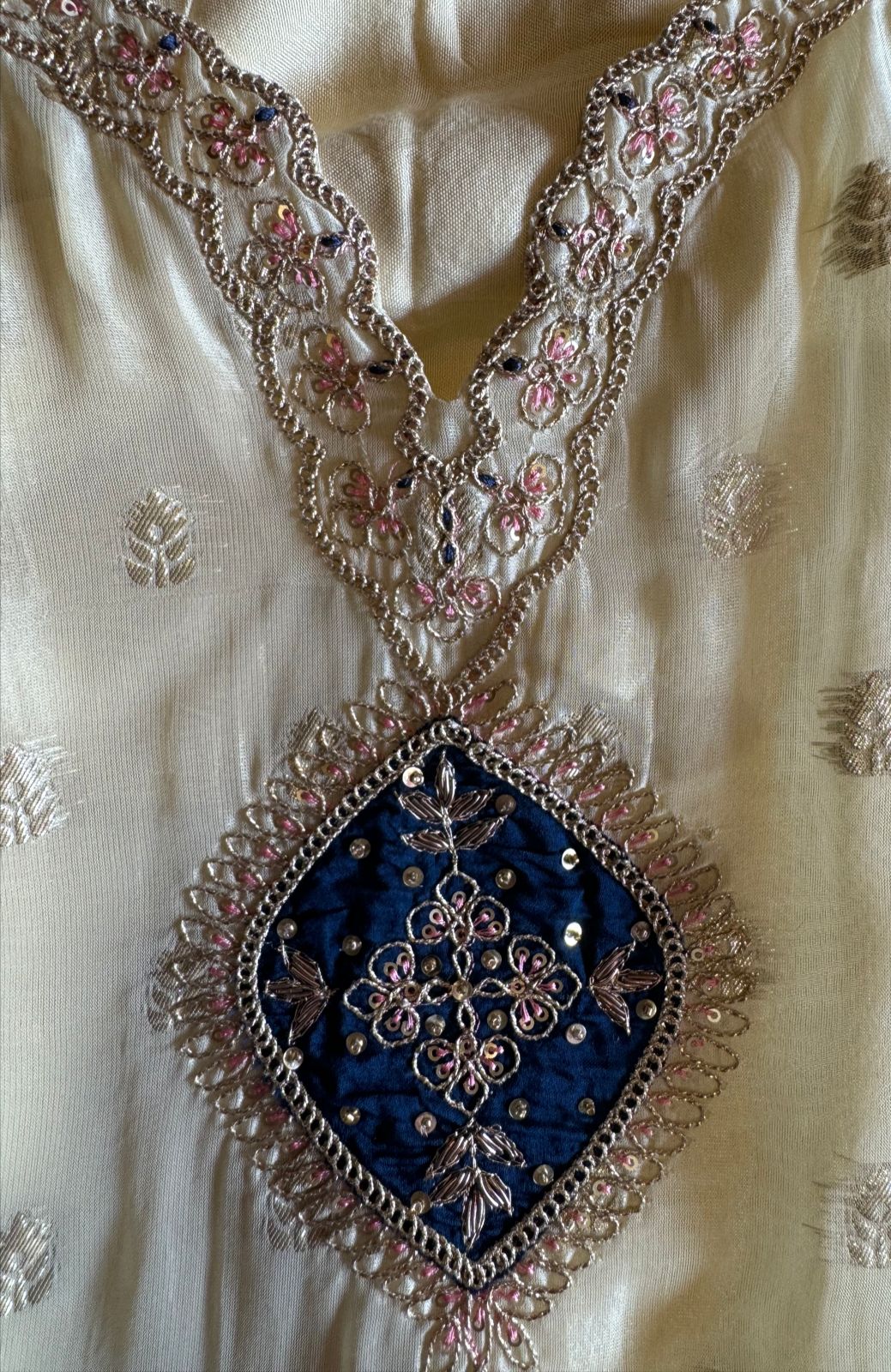 Soft organza Unstitched shirt with gold zari booties highlighting on the shirt front