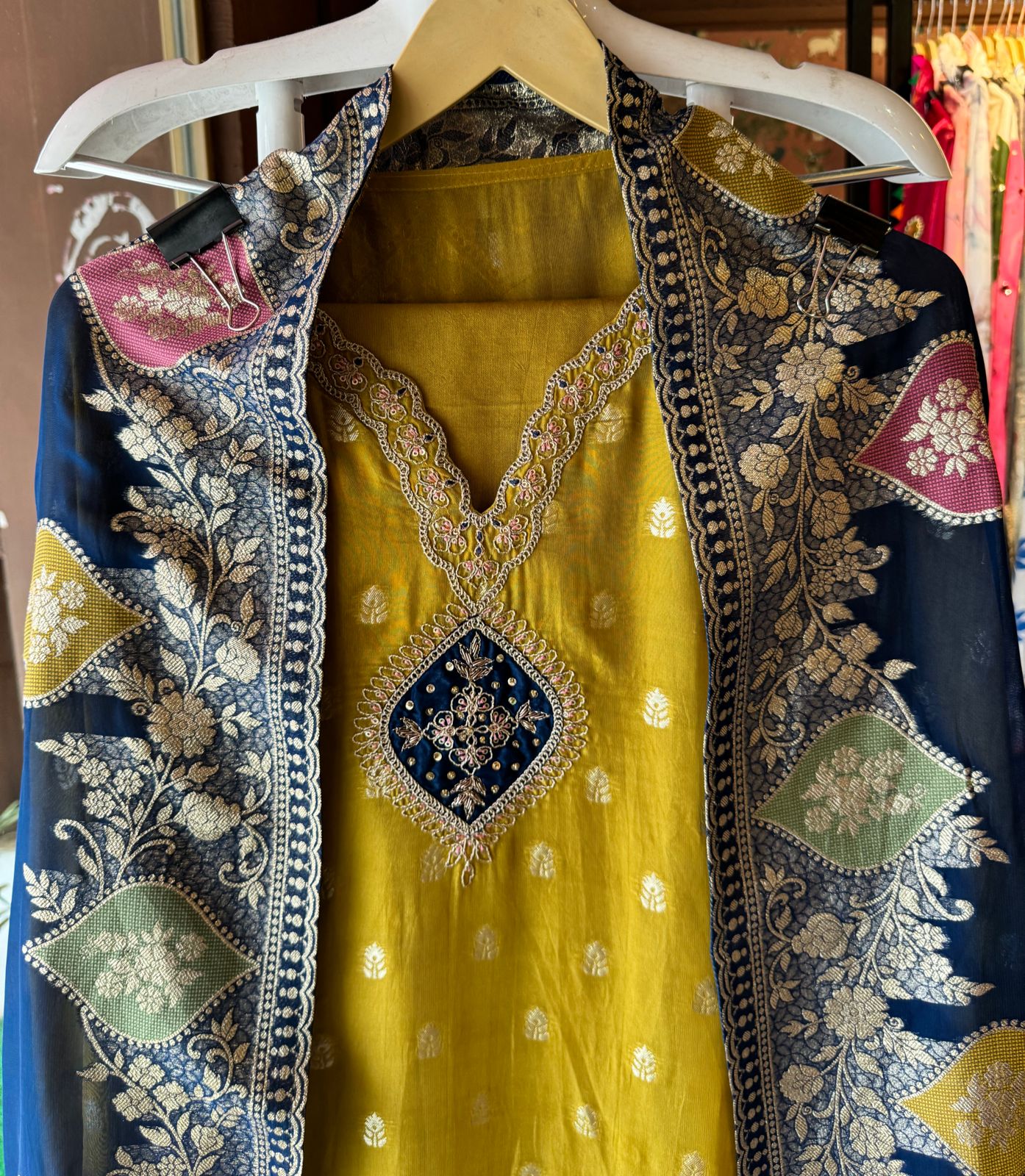 Soft organza Unstitched shirt with gold zari booties highlighting on the shirt front