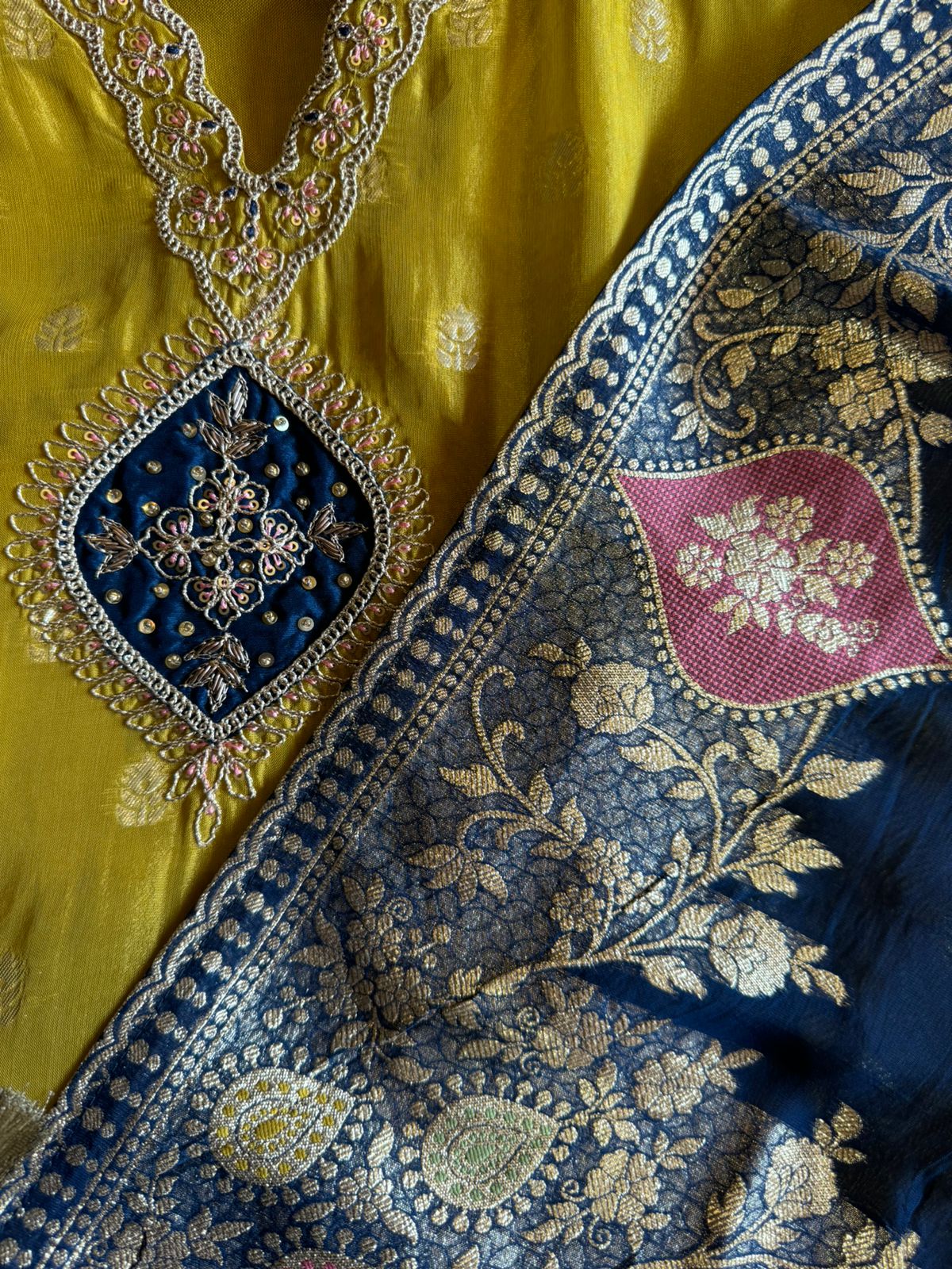 Soft organza Unstitched shirt with gold zari booties highlighting on the shirt front