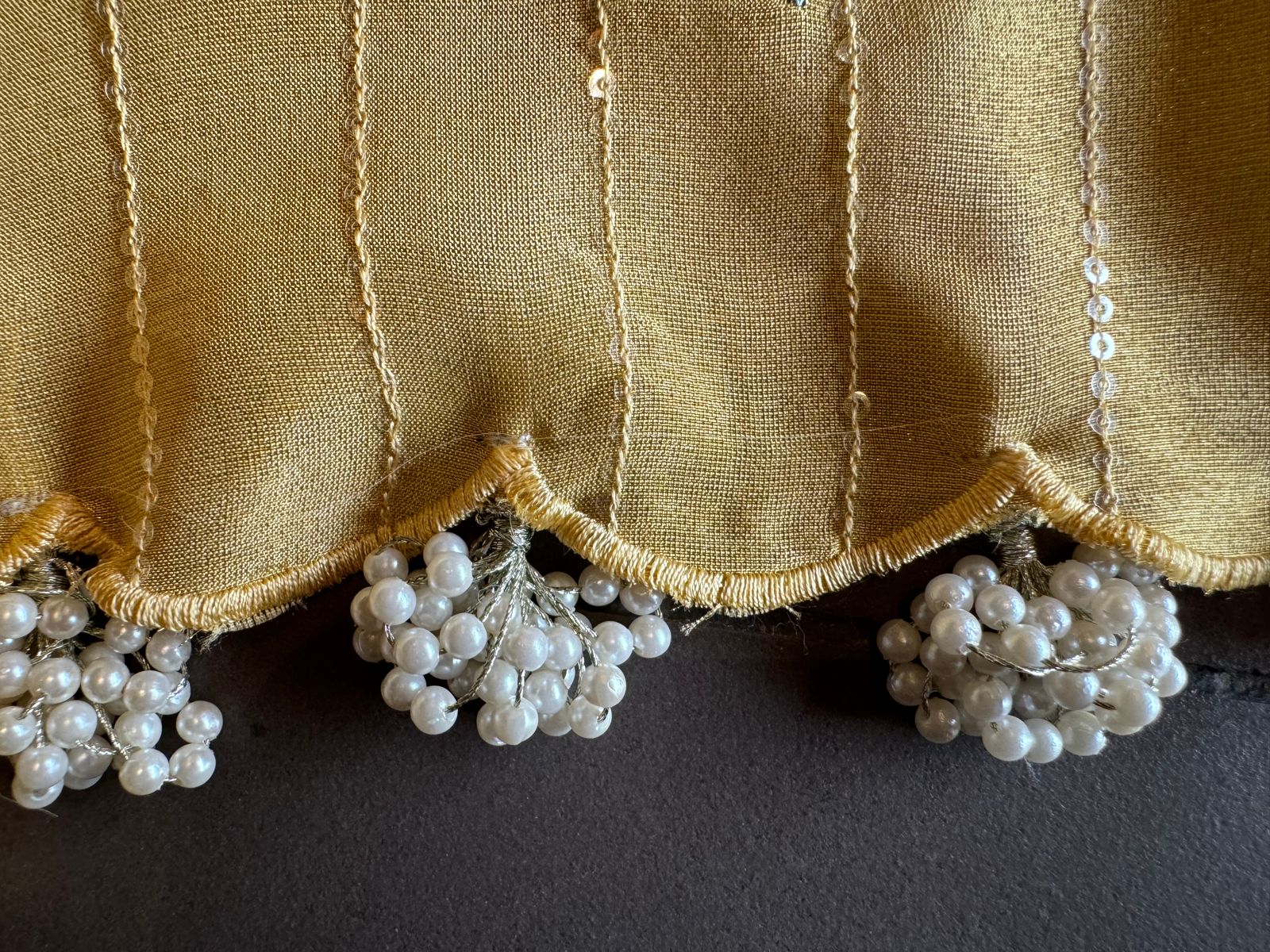 The shirt front has very beautiful floral embroidered boota with pearl work detailings