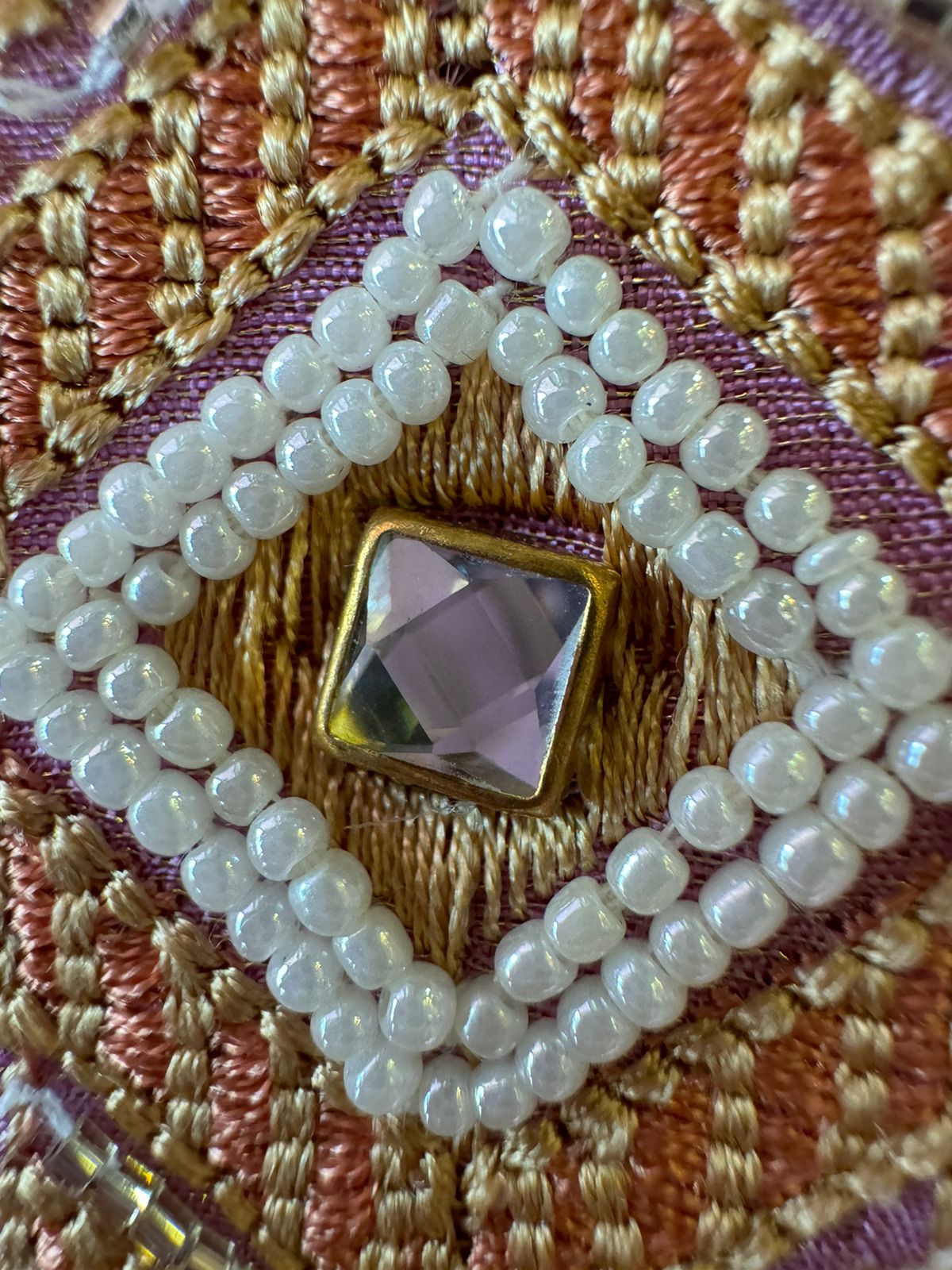 The shirt front has very beautiful floral embroidered boota with pearl work detailings