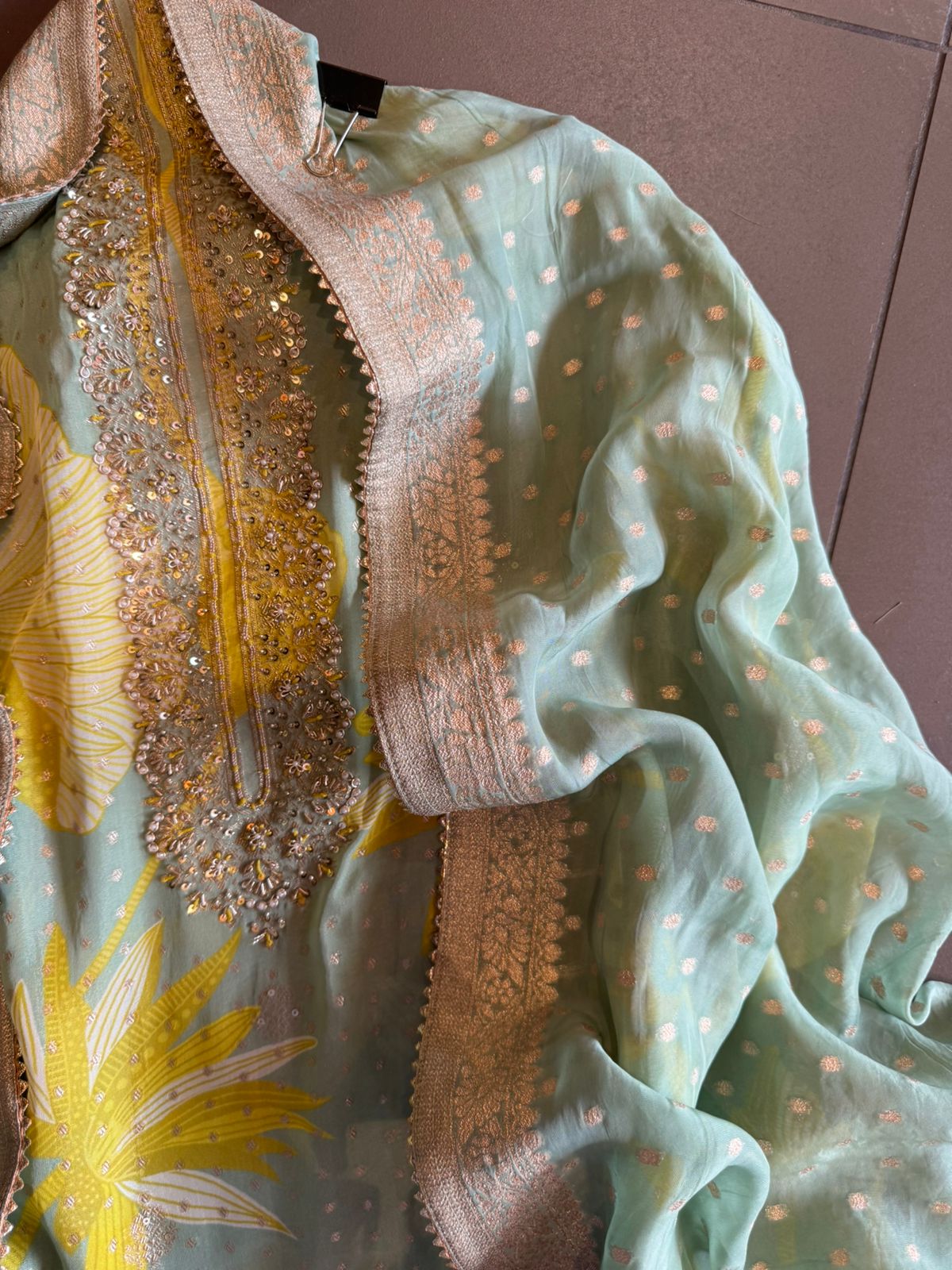 Organza full size zari bootie work dupatta with four sides banarsi border and tassels attached.