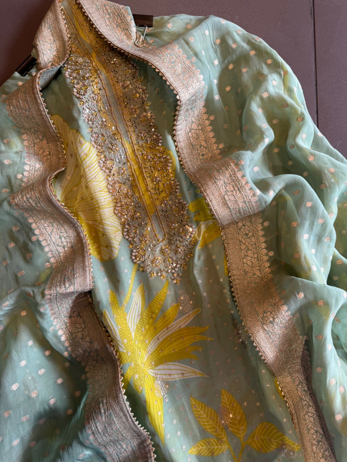 Organza full size zari bootie work dupatta with four sides banarsi border and tassels attached.