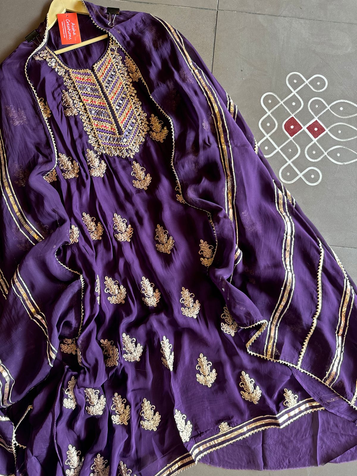 Soft organza Unstitched shirt with heavily embroidered zari bootas with leather gotta work