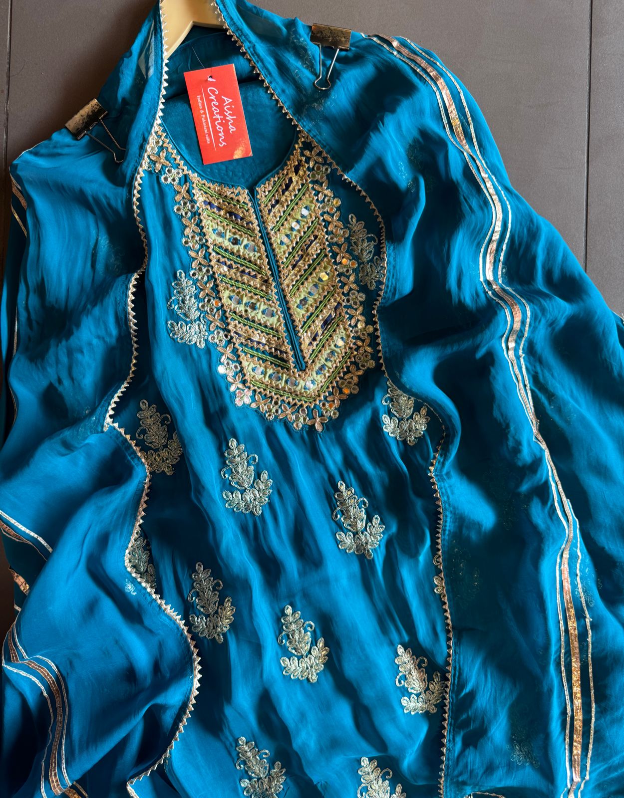 Soft organza Unstitched shirt with heavily embroidered zari bootas with leather gotta work