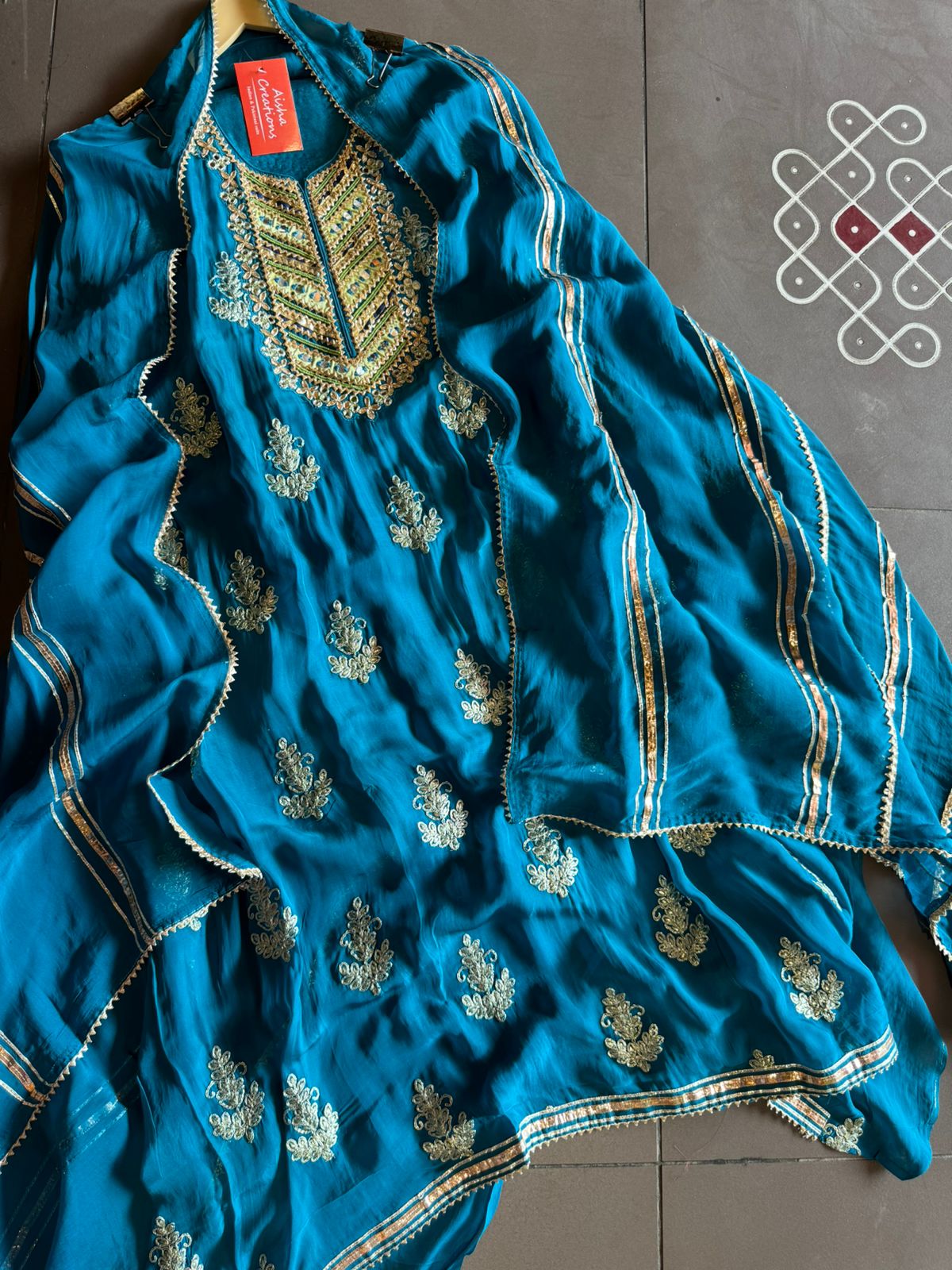 Soft organza Unstitched shirt with heavily embroidered zari bootas with leather gotta work