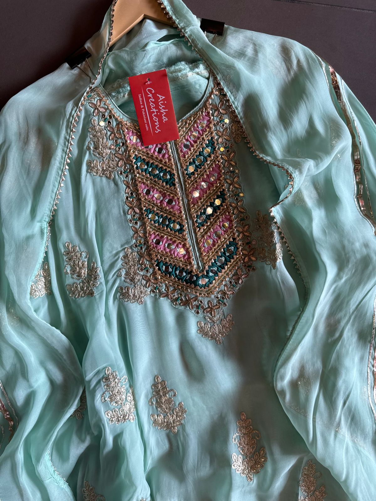 Soft organza Unstitched shirt with heavily embroidered zari bootas with leather gotta work