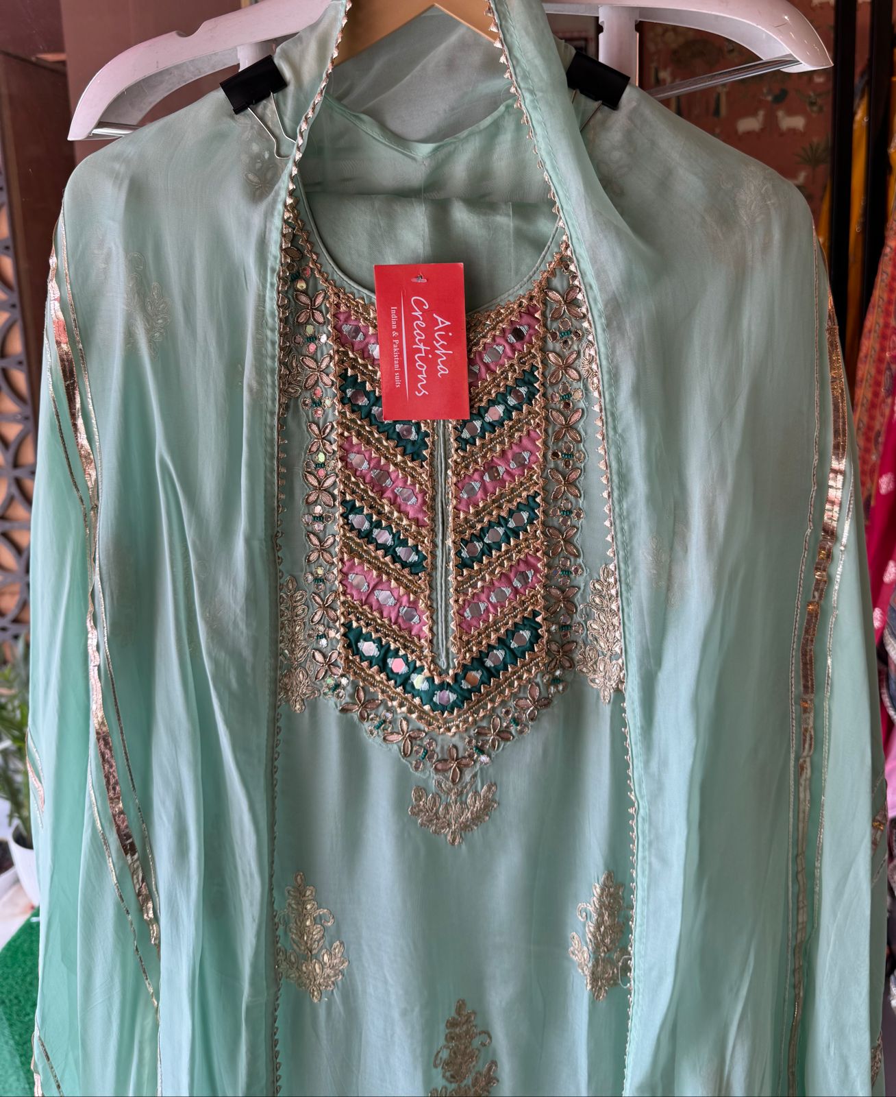 Soft organza Unstitched shirt with heavily embroidered zari bootas with leather gotta work