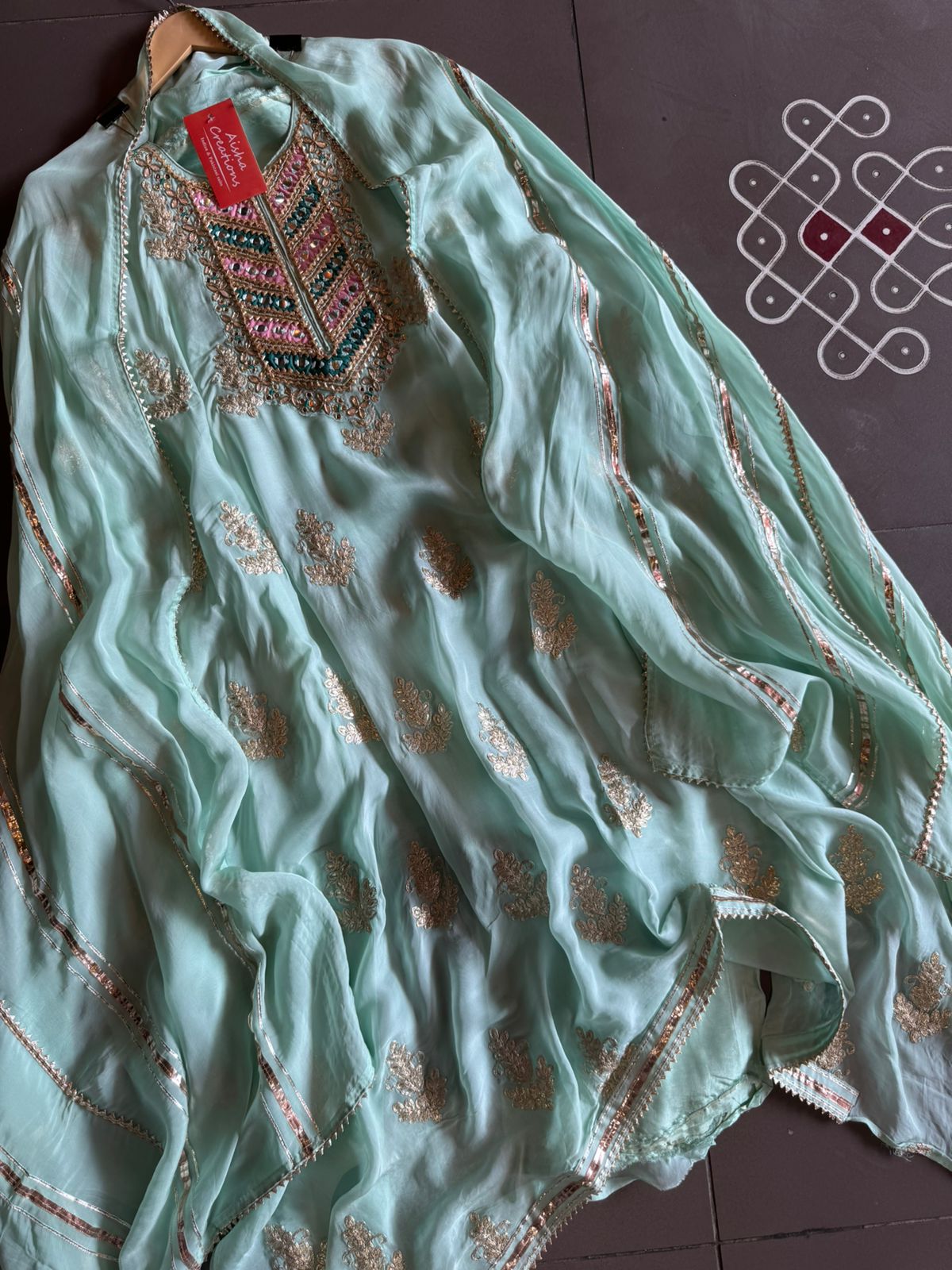 Soft organza Unstitched shirt with heavily embroidered zari bootas with leather gotta work