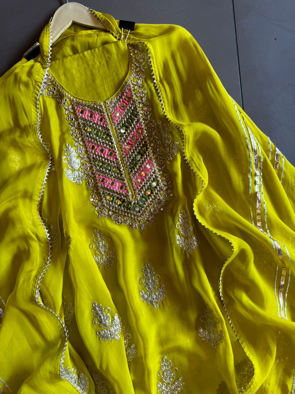 Soft organza Unstitched shirt with heavily embroidered zari bootas with leather gotta work