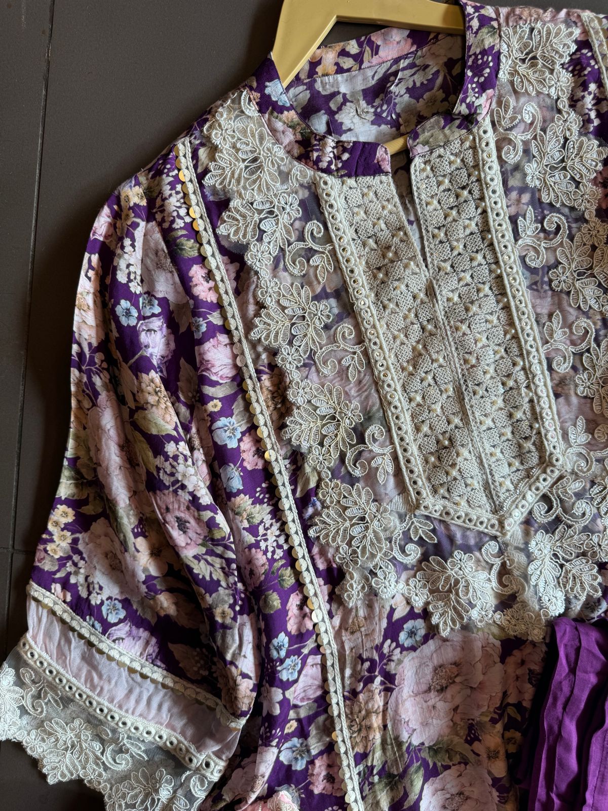 Stitched kurta on Pure muslin with heavy neckline with thread and dori embroidery