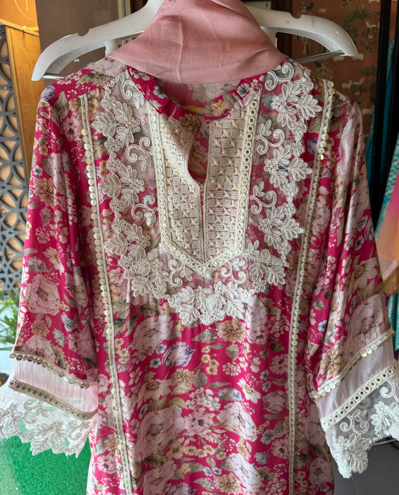 Stitched kurta on Pure muslin with heavy neckline with thread and dori embroidery