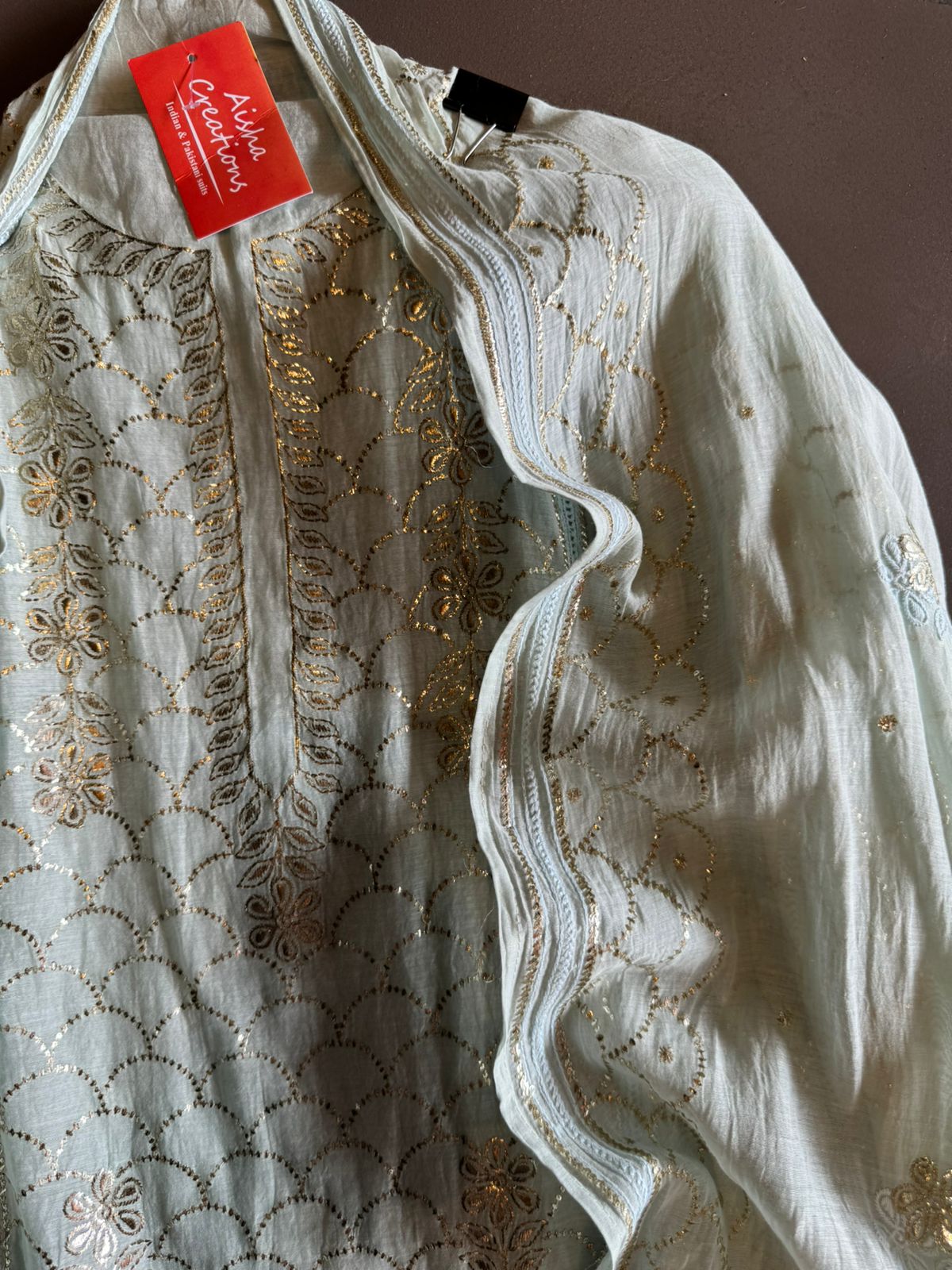 Unstitched Mul suit pieces with original pitta work done on the full shirt front giving it a very Beautiful & rich look