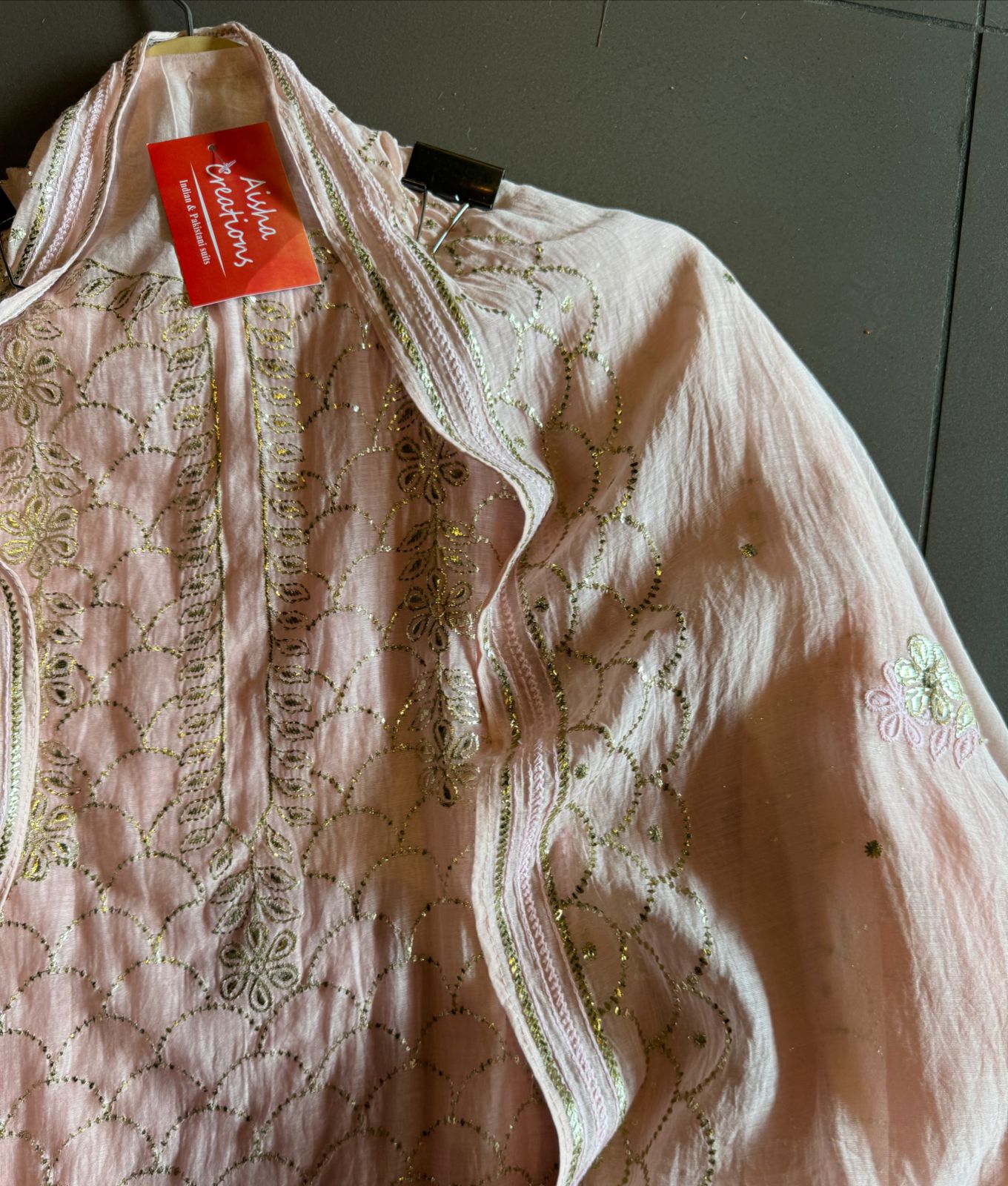 Unstitched Mul suit pieces with original pitta work done on the full shirt front giving it a very Beautiful & rich look