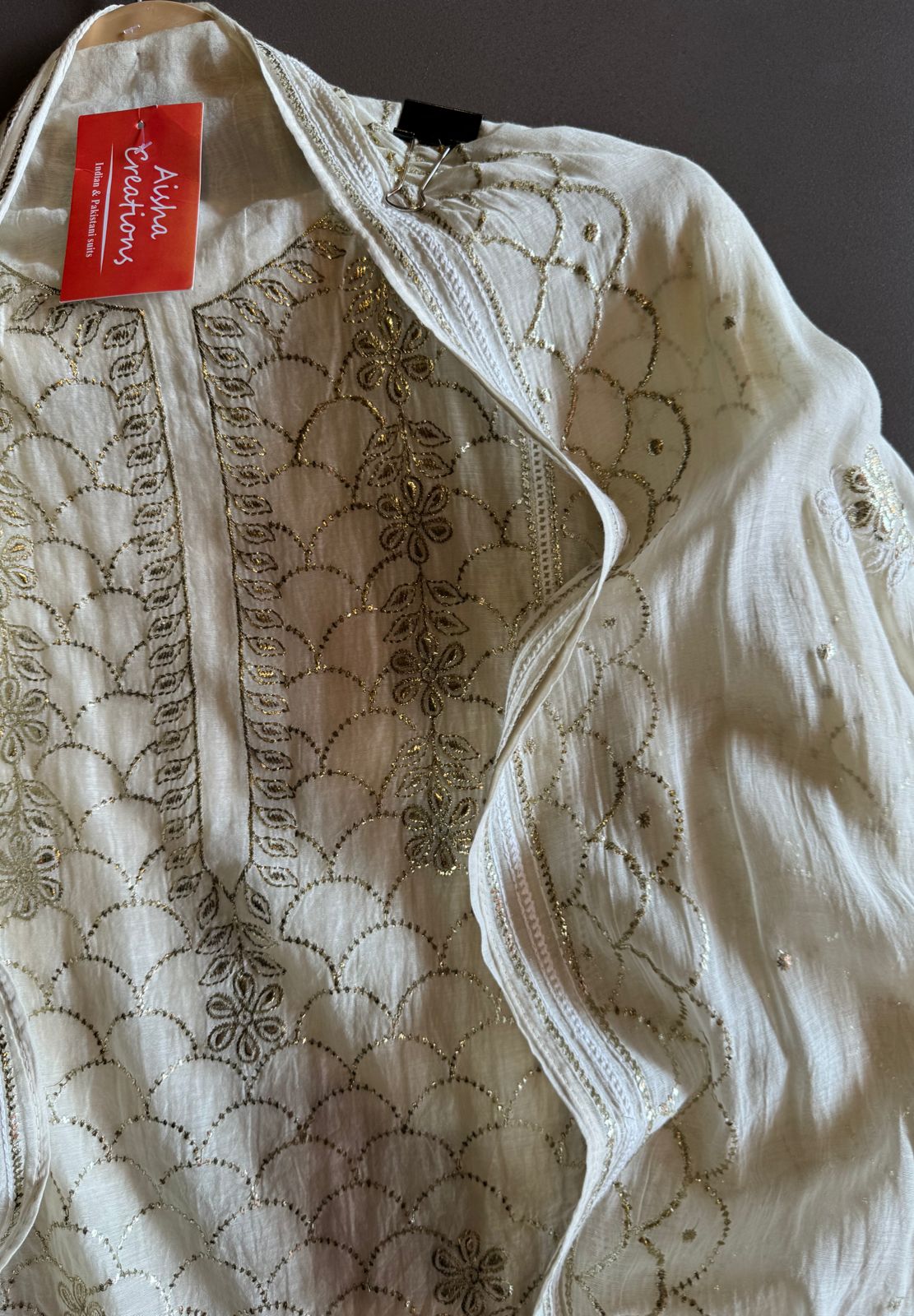 Unstitched Mul suit pieces with original pitta work done on the full shirt front giving it a very Beautiful & rich look