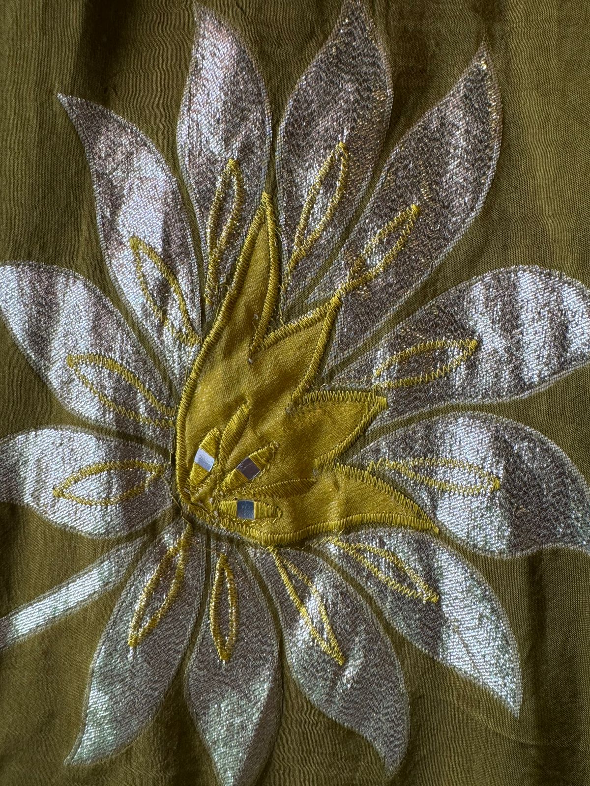 Pure Shimmer tissue Unstitched Shirt with Moti work on the neckline with thread and gotta patti detailings as well.